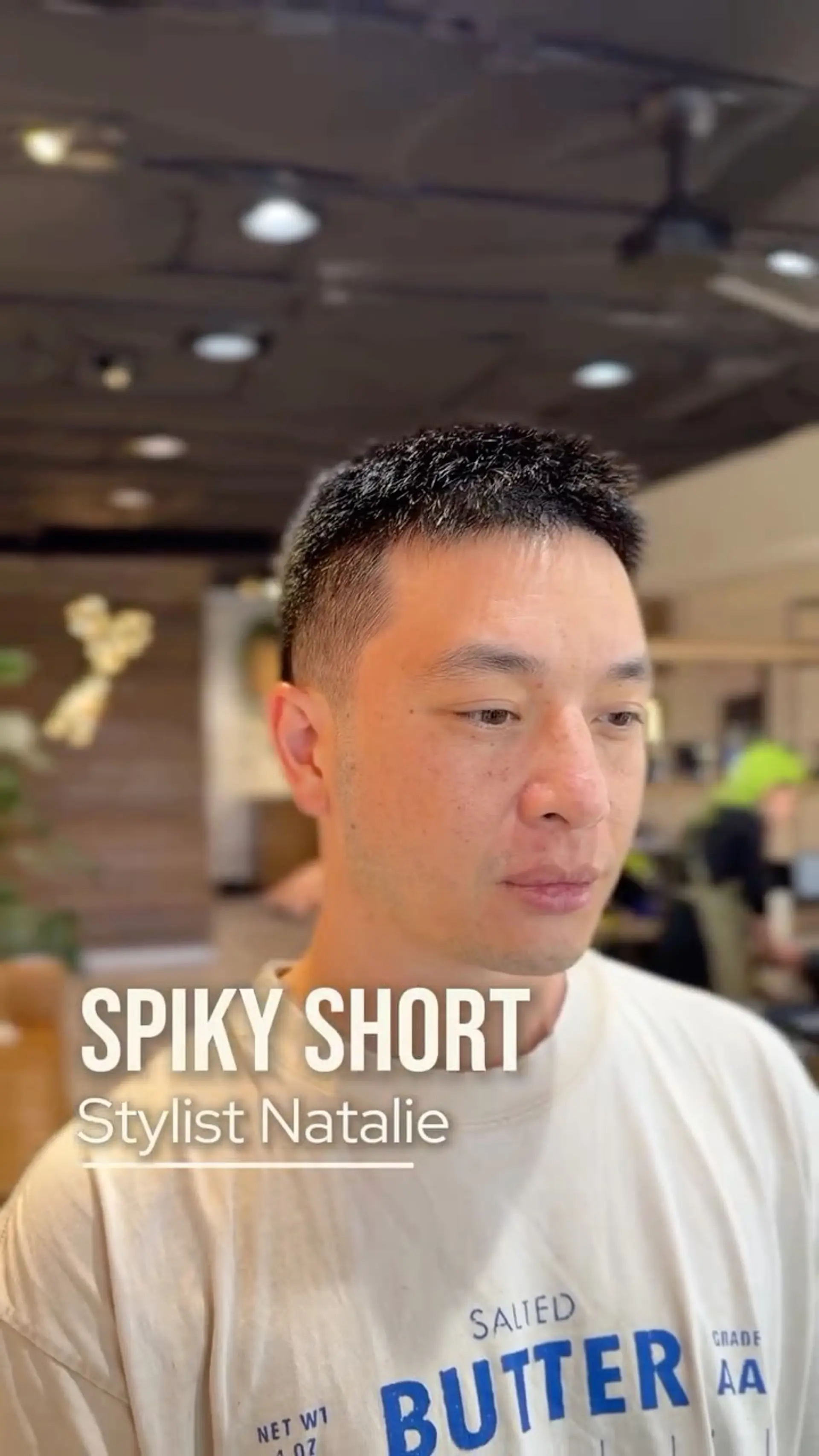 A clean, textured short men's cut with a tapered fade on the sides and spiky styling on top. 1