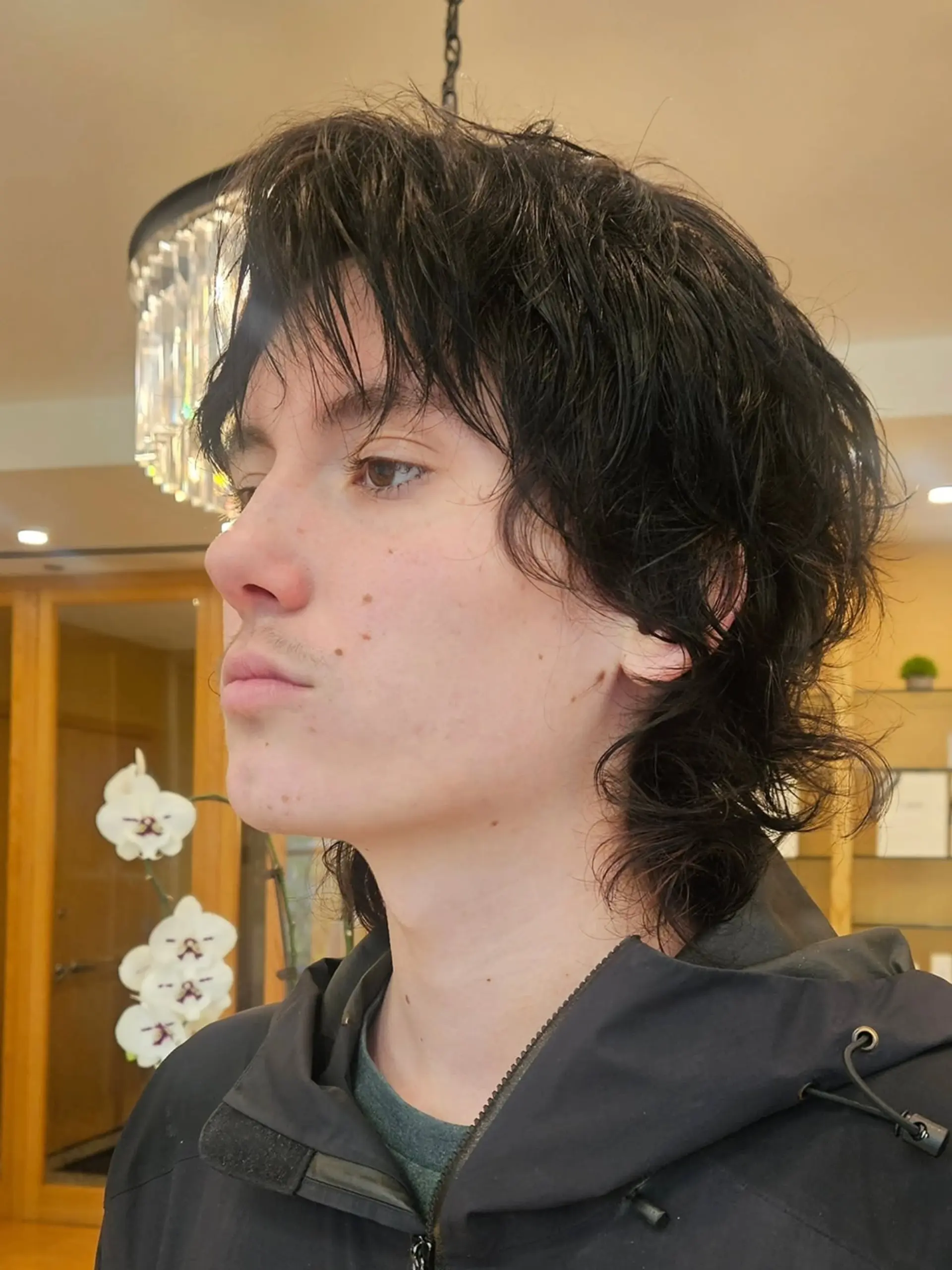 A textured shag mullet with a modern twist. It features short layers on top that blend into longer, wavy lengths in the back. 2