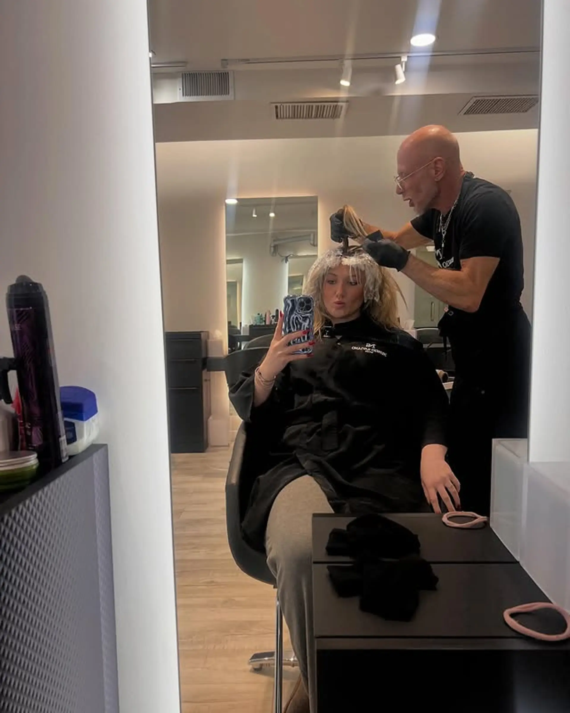 A bronde balayage hairstyle with a seamless blend of brown and blonde for a sun-kissed effect. 1