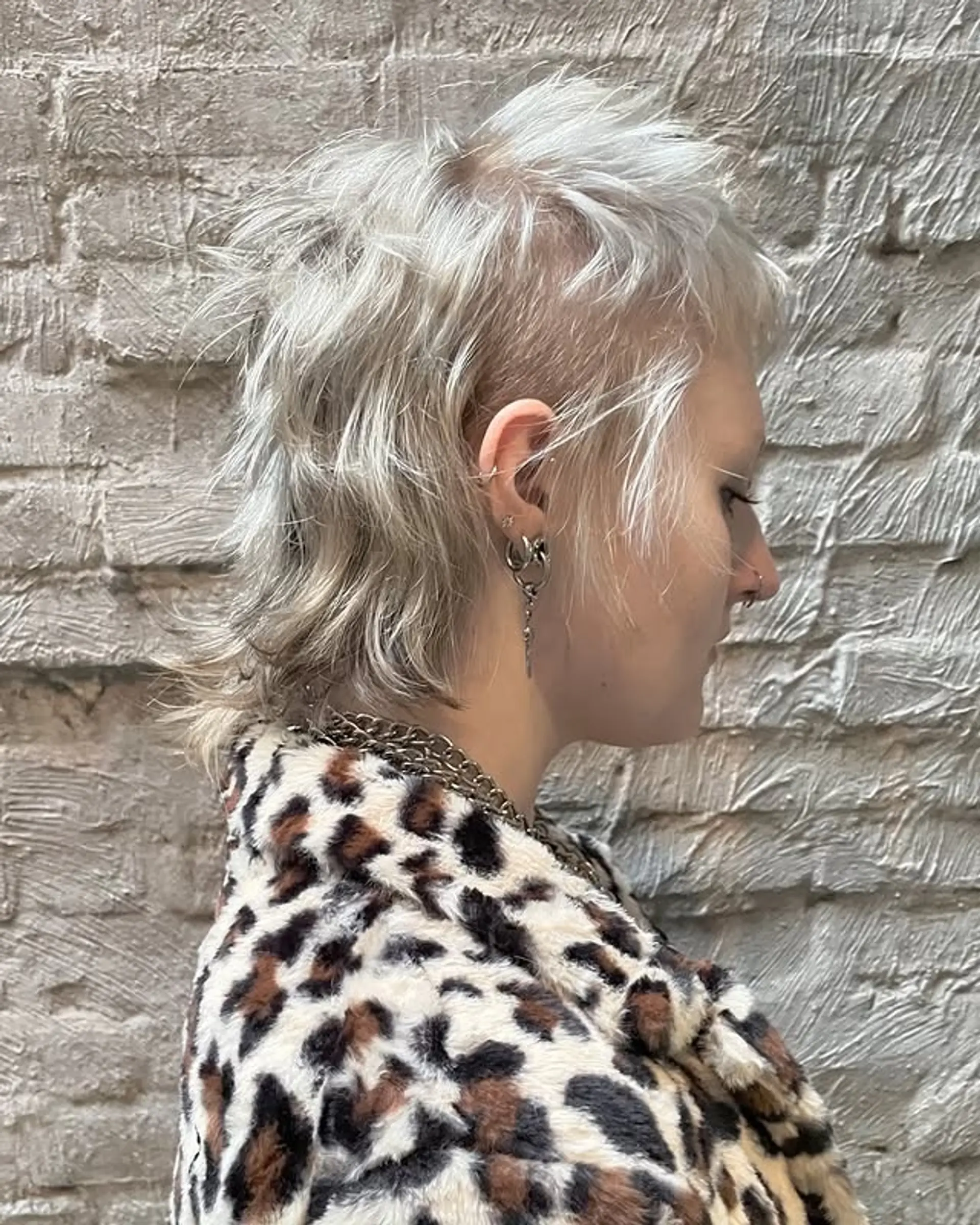 This is a modern shag mullet with an undercut and choppy layers for a textured and edgy look. 1