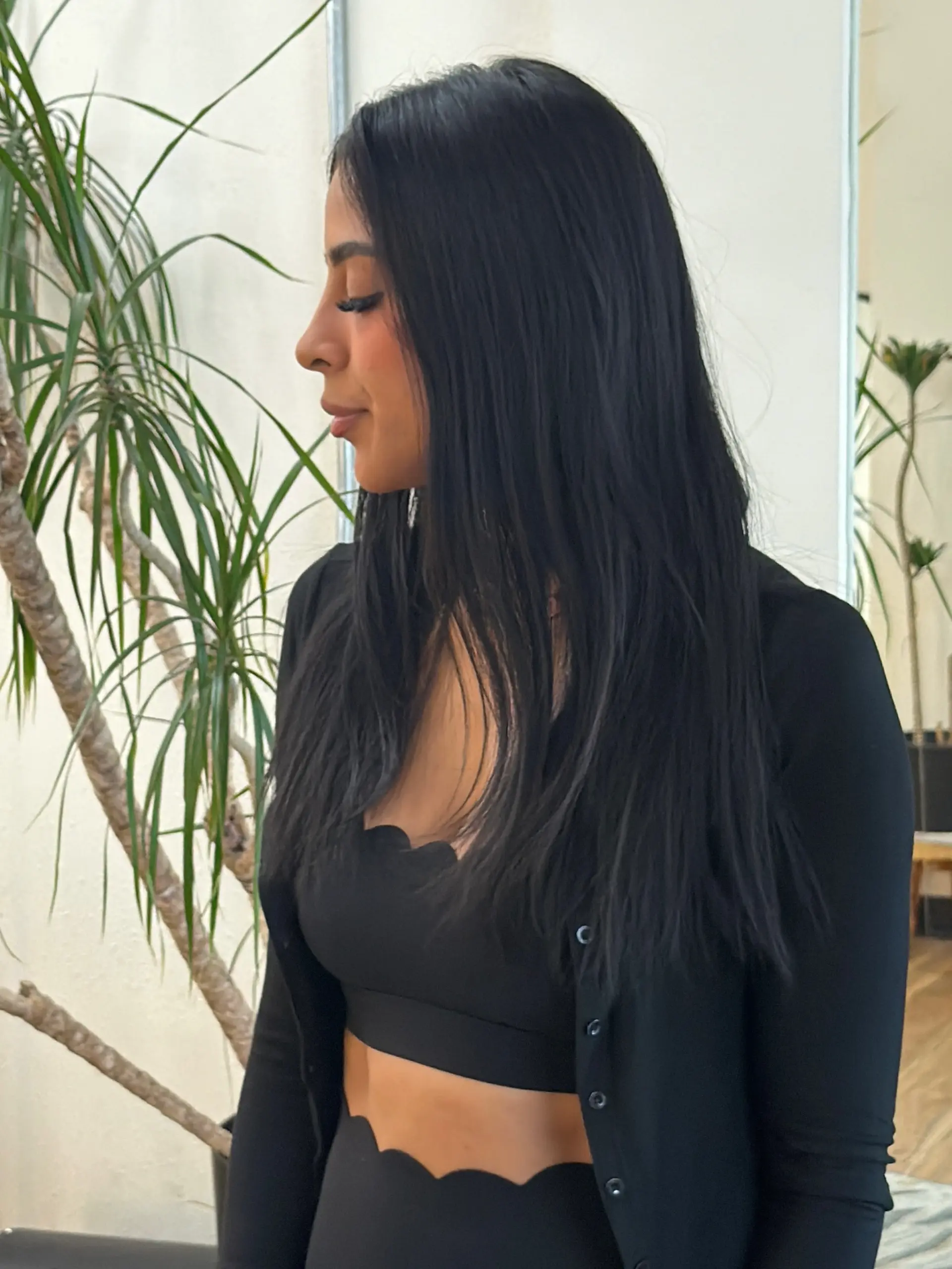 Long, sleek jet-black hair with a straight, smooth texture and subtly textured ends falling past the chest. 1