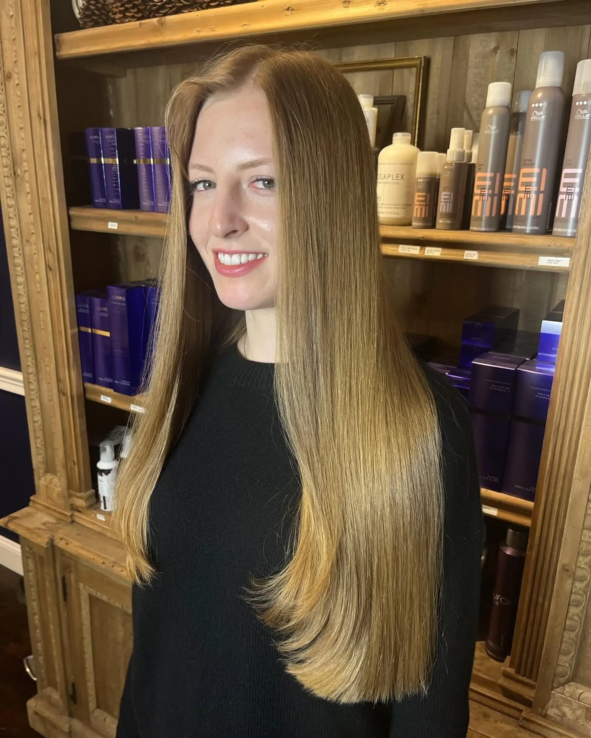 Very long, straight blonde hair with a smooth texture and even cut, showcasing natural shine and full volume. 2