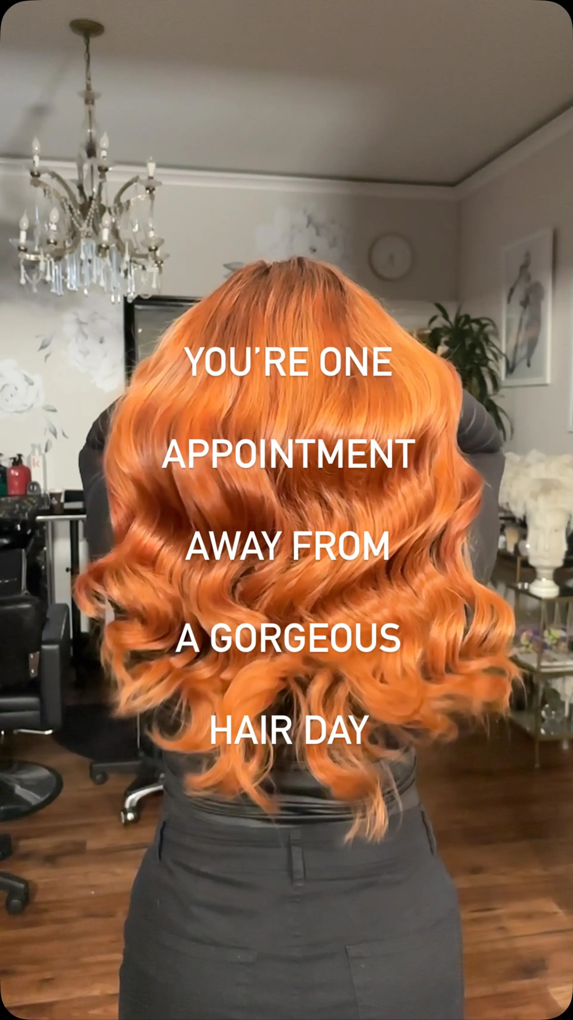 Long, brilliant copper-orange hair styled into glossy, voluminous waves that cascade down the back. 1