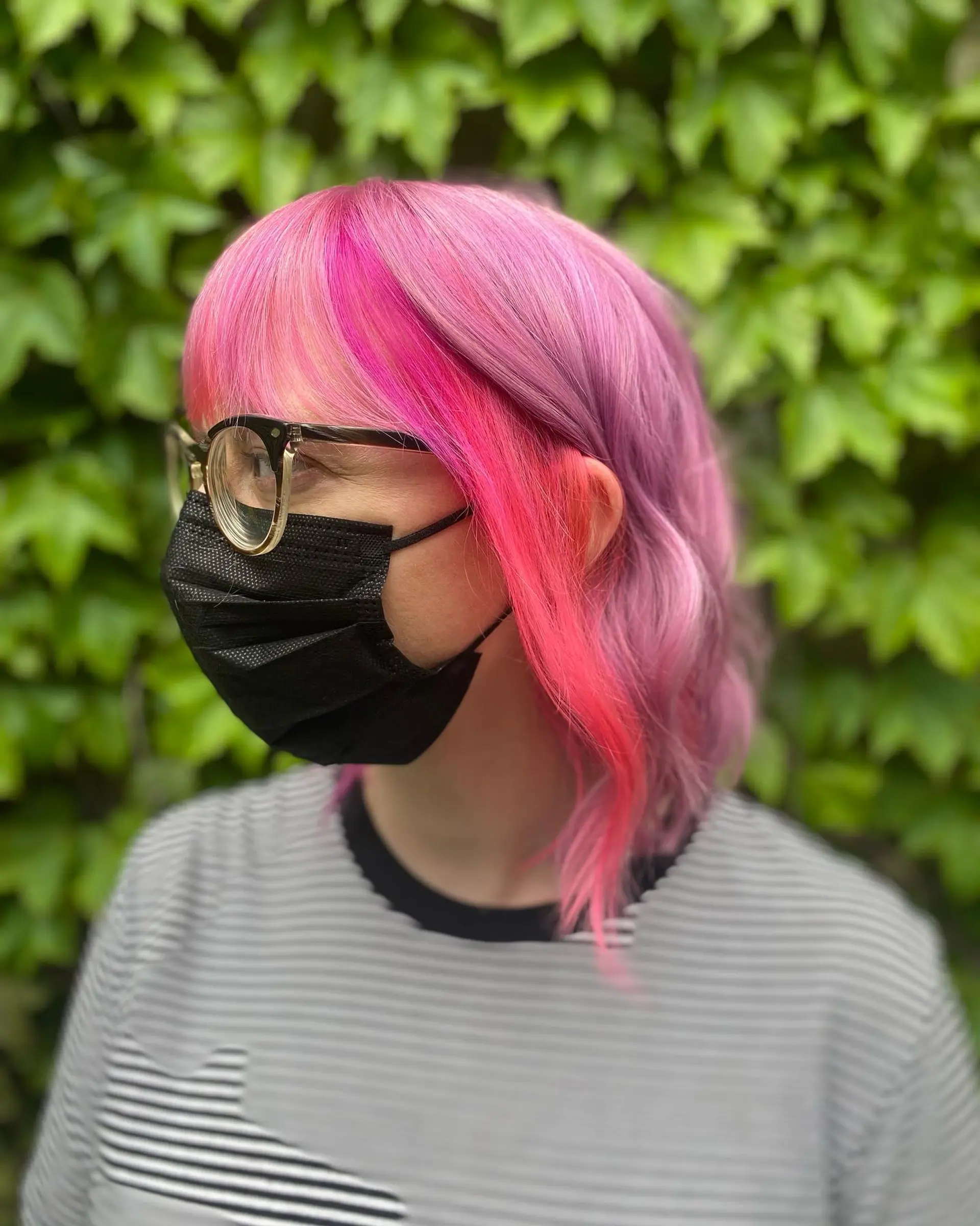 A medium length shag haircut with textured waves and a trendy, colorful ombre. 2