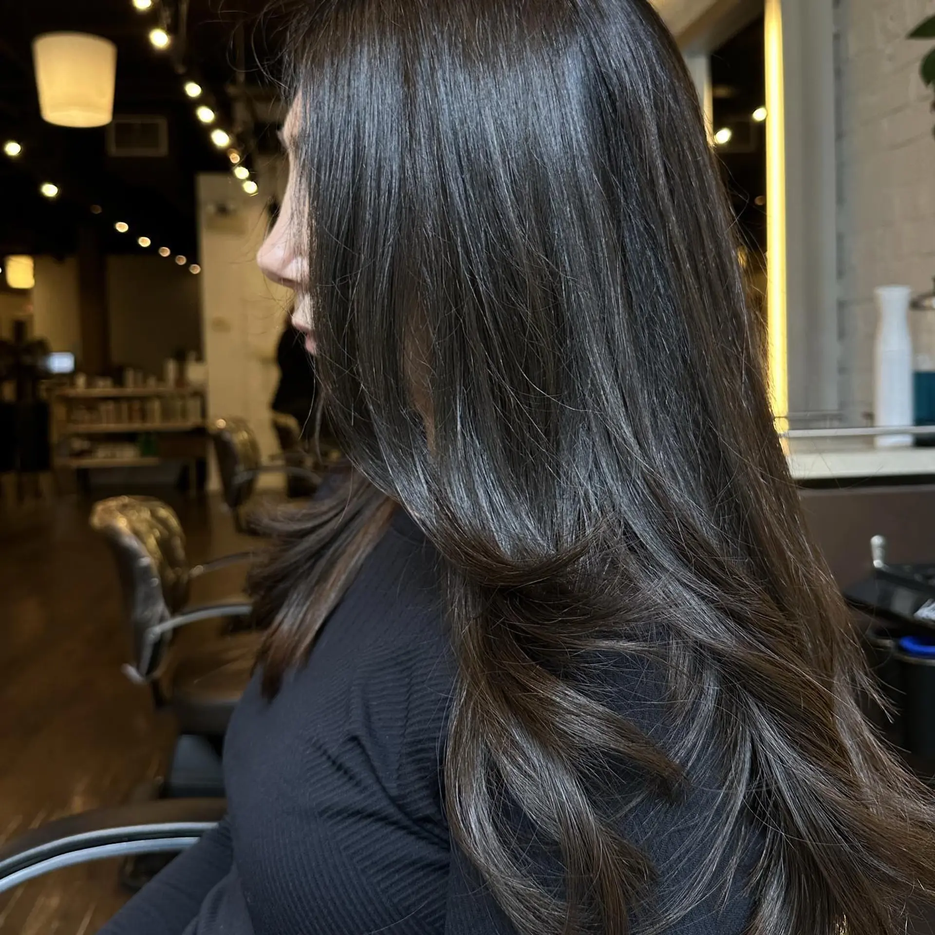 Long, straight brunette hair with soft layers for movement. 1