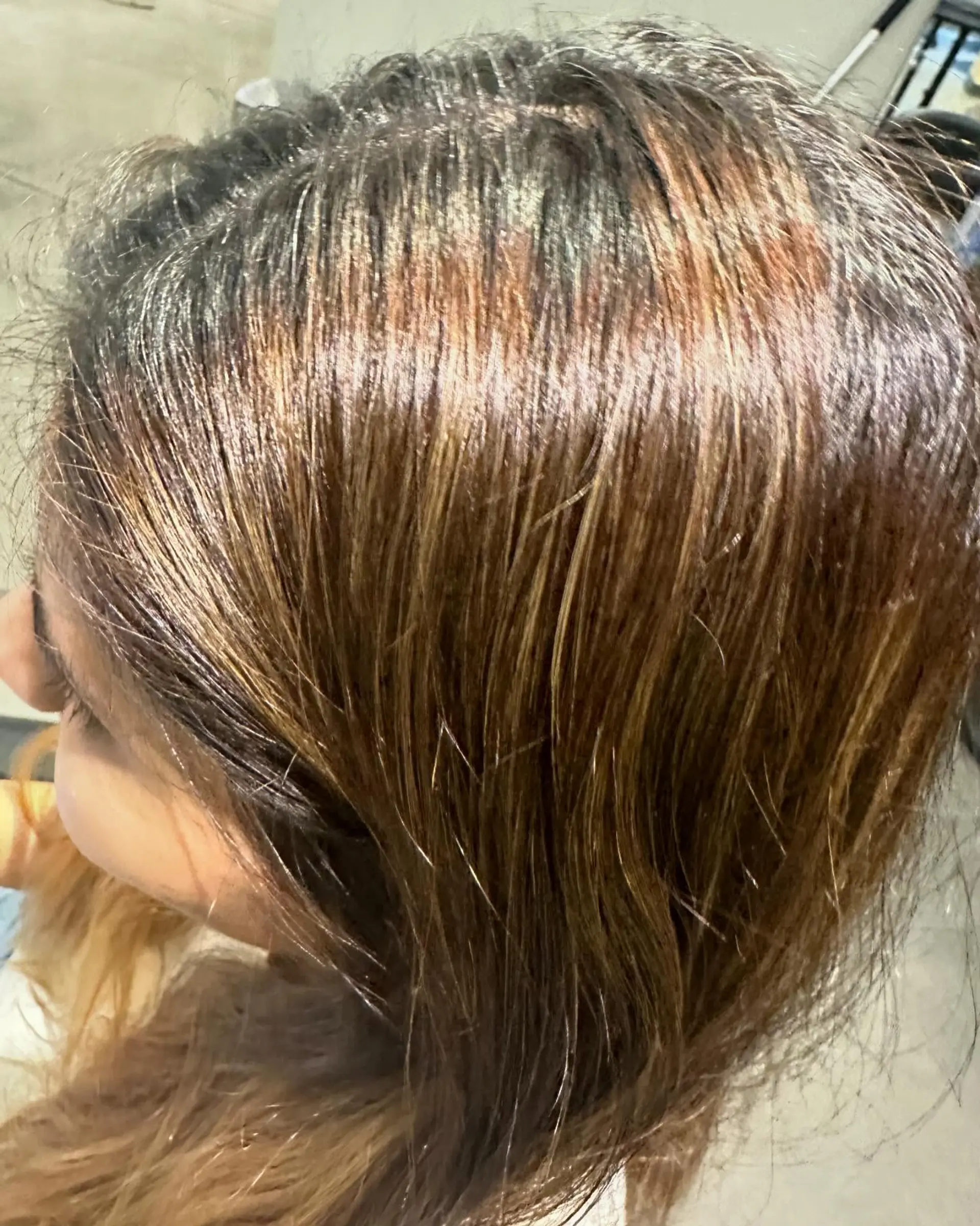 Rich brunette hair featuring smooth long layers and a high-shine gloss finish that enhances tonal depth. 1