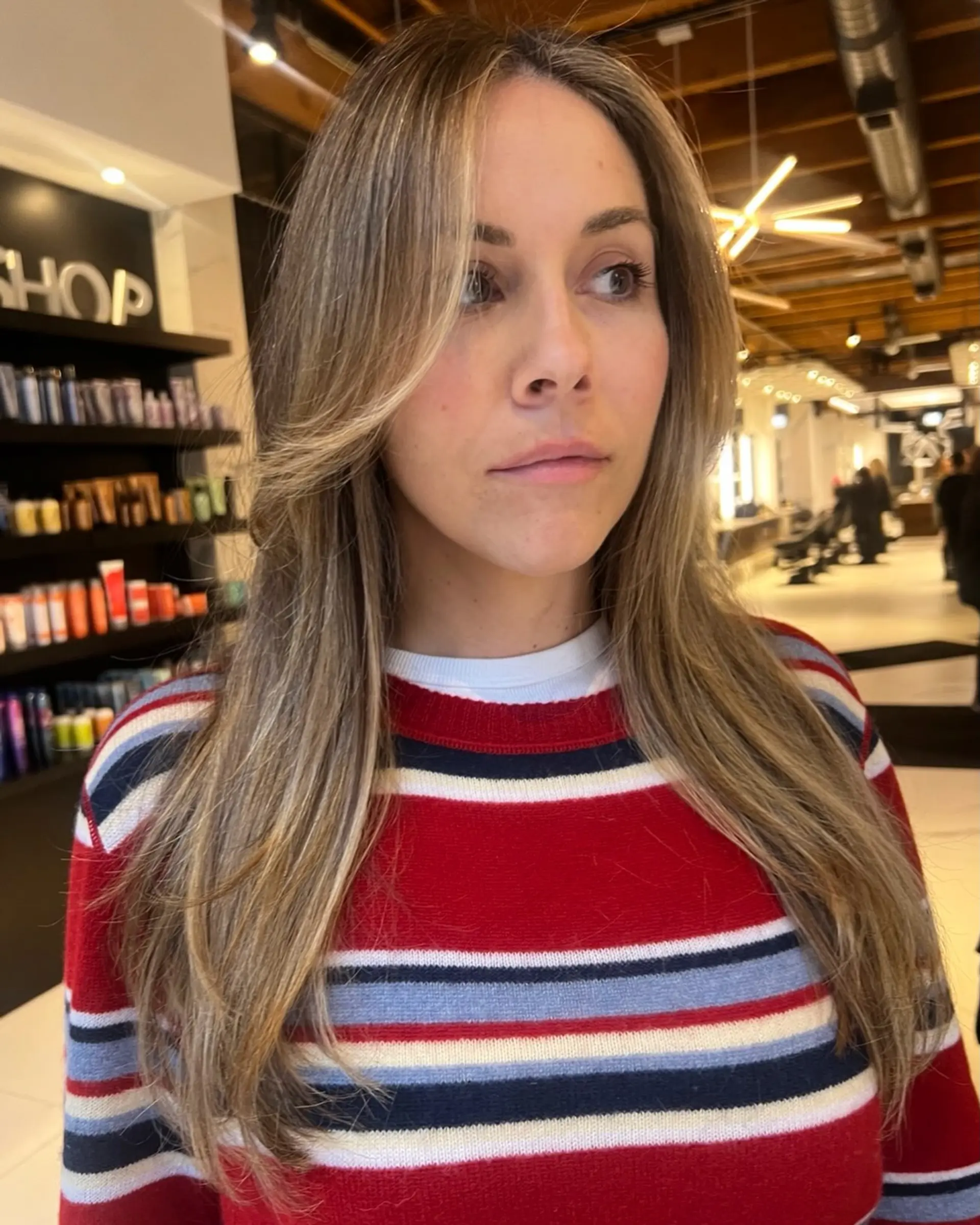 Long smooth hair featuring seamless, blended blonde highlights on a light brown base with face-framing layers. 1