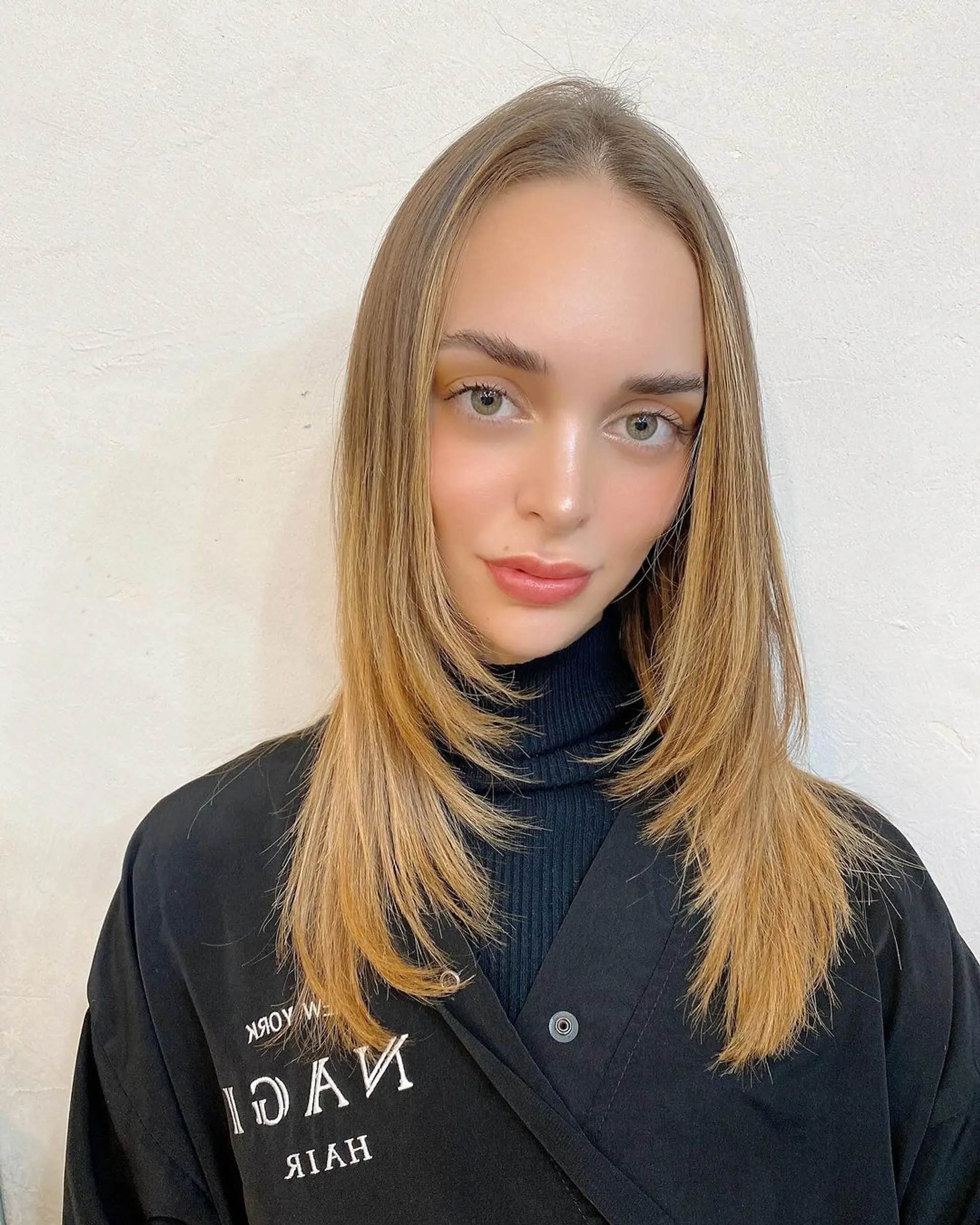 Beautifully straight, medium-length blonde hair post Keratin Smoothing Treatment by Coco. 1