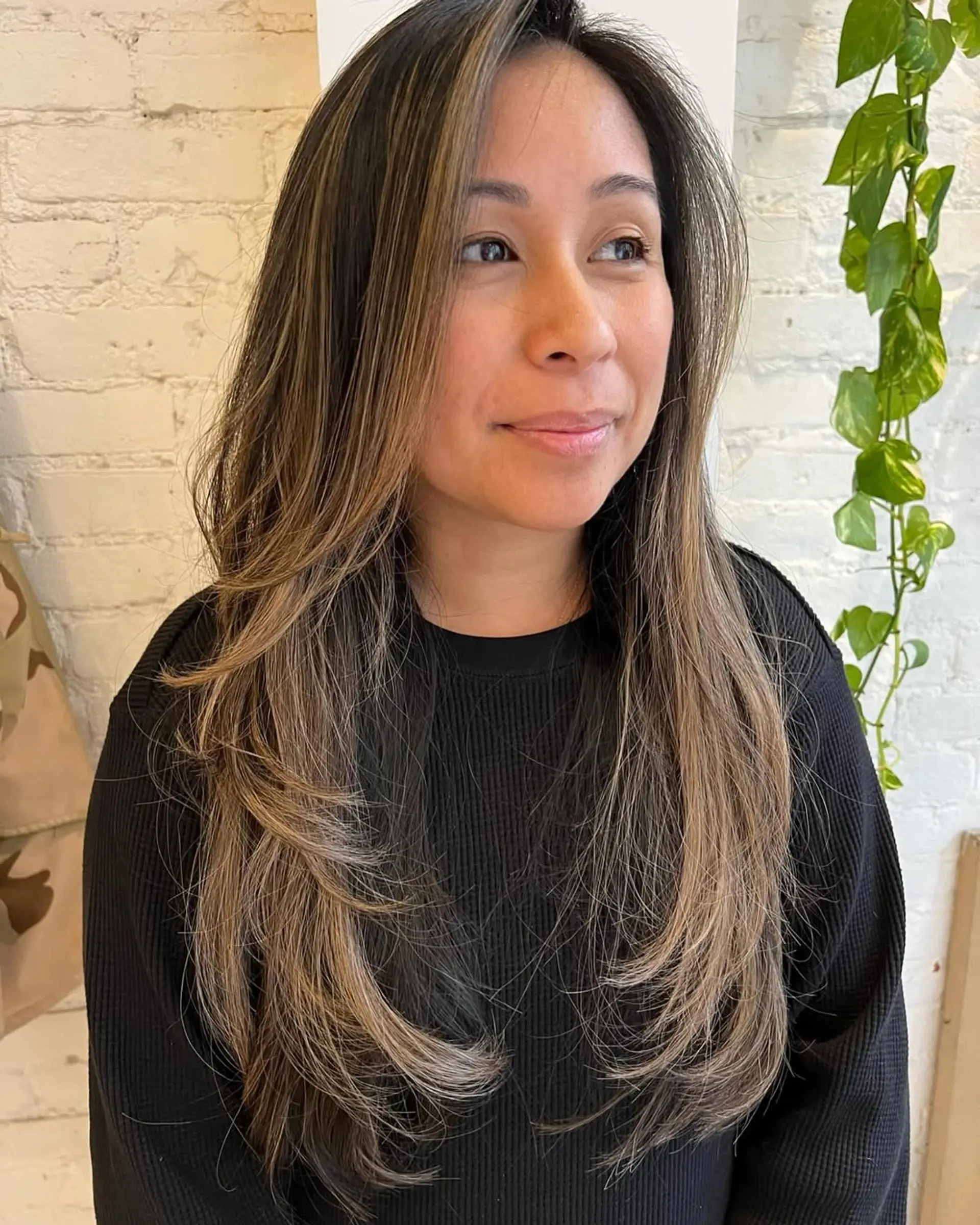 Long layered haircut with a bronde balayage. 2