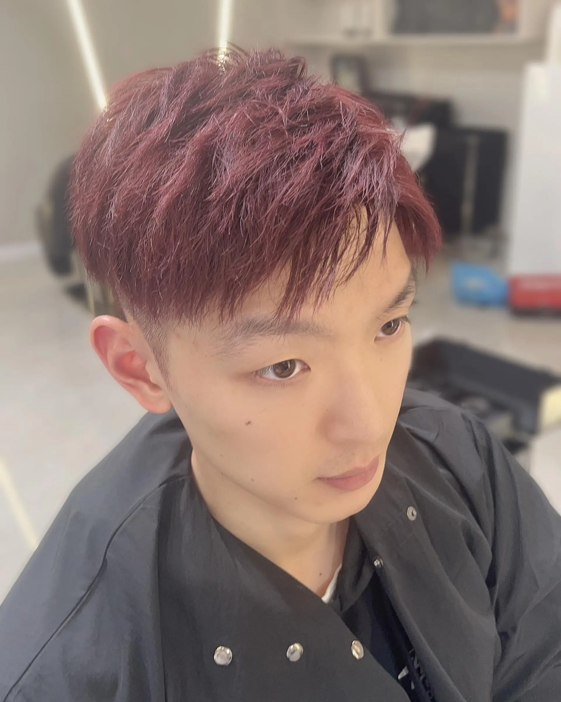 Short, textured crop with tapered sides. 2