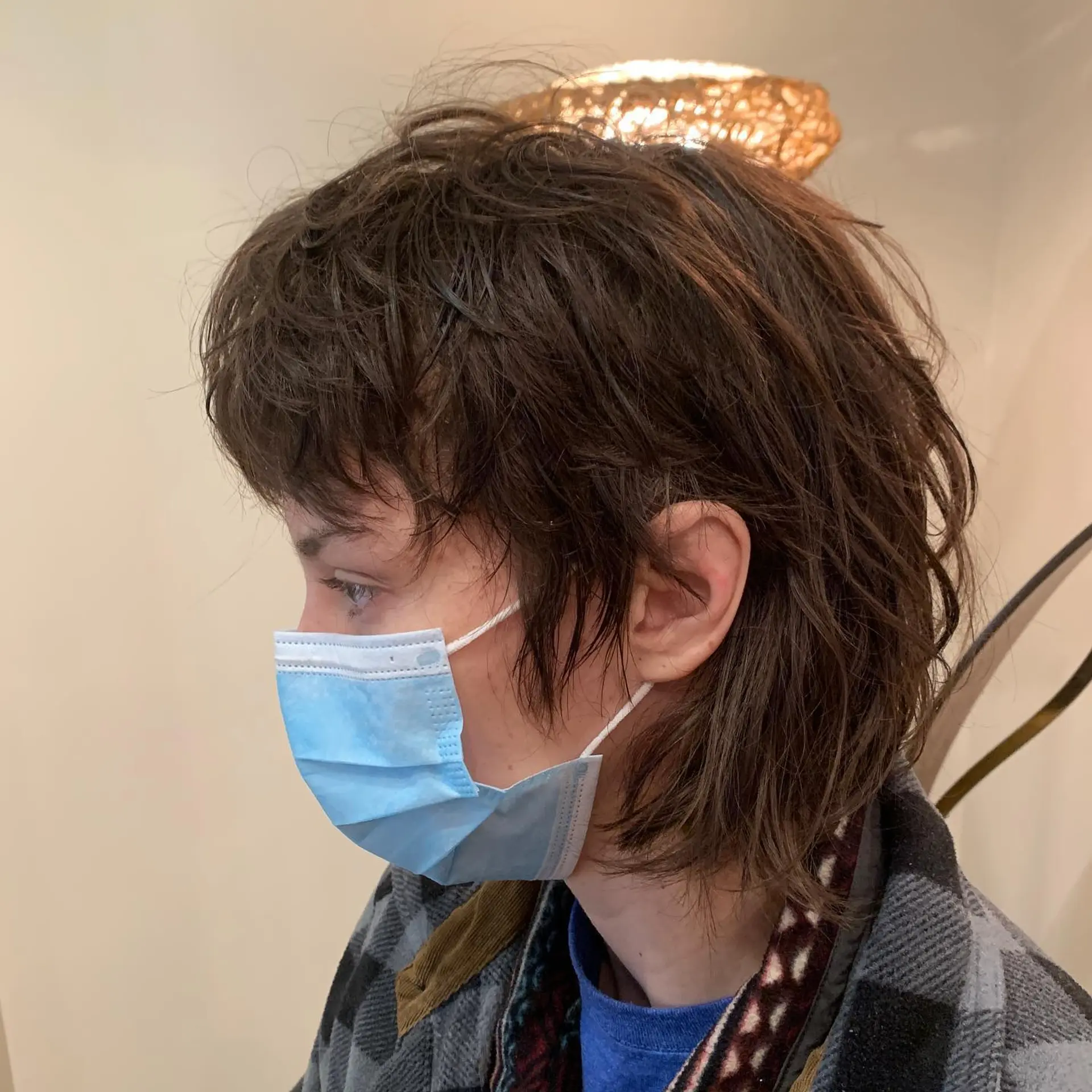 A choppy, layered shag mullet with a textured, messy finish. 1