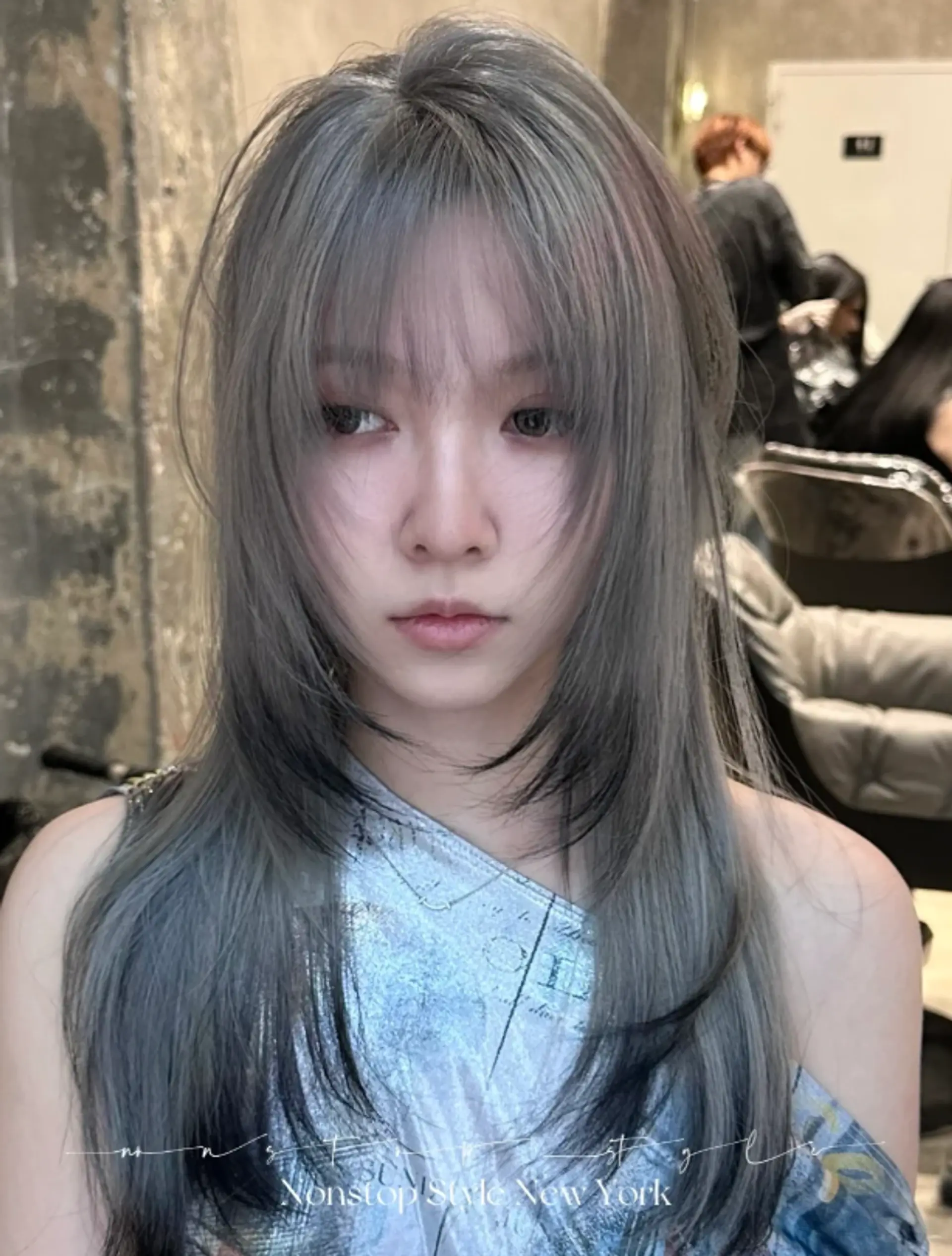 A long, straight hairstyle with a stunning ash gray and silver color palette, featuring intricate layers, a soft fringe, and delicate, face-framing layers.
(NonstopStyle: by Hiro) 2