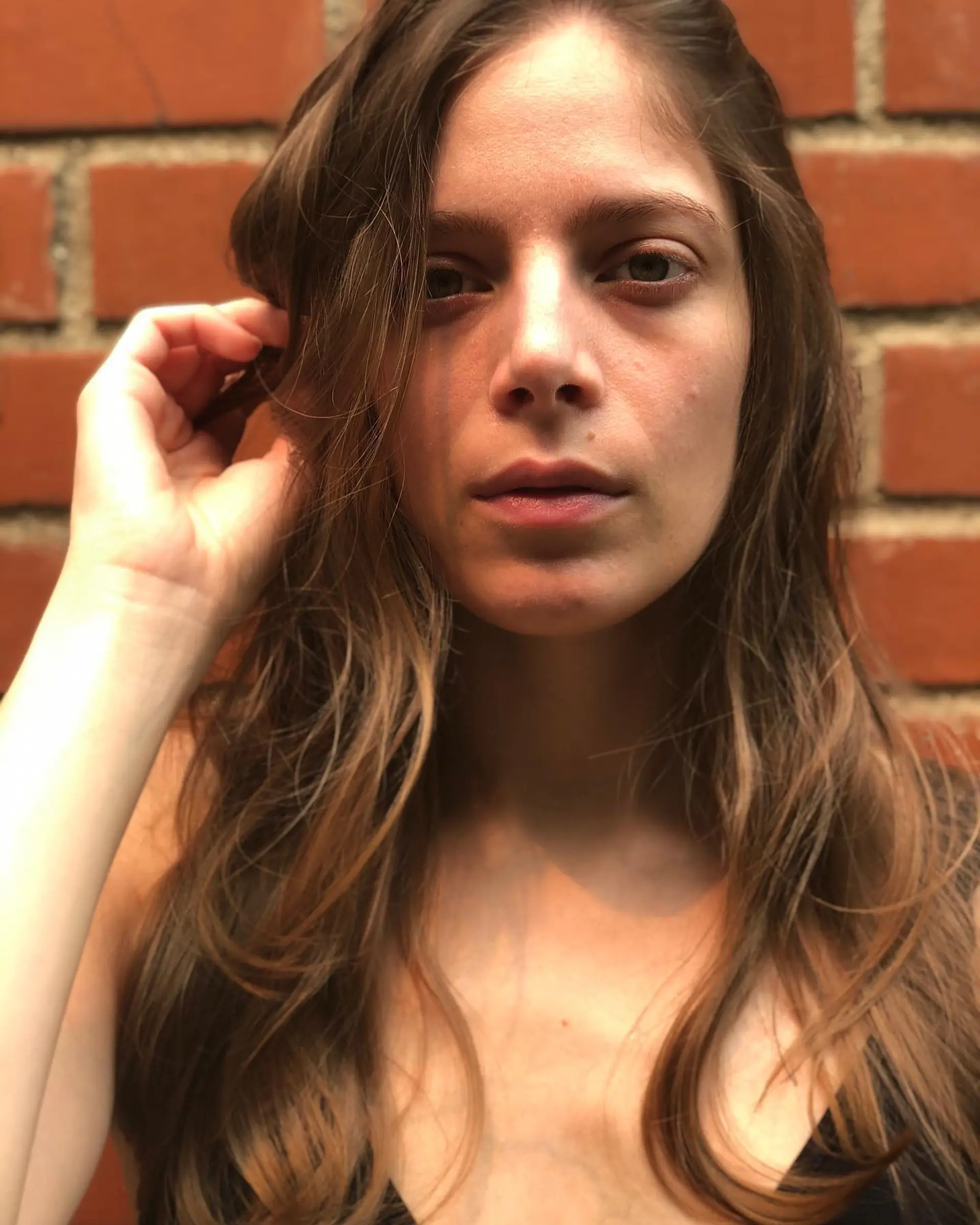 Long light brown hair featuring soft waves and face-framing layers. 1