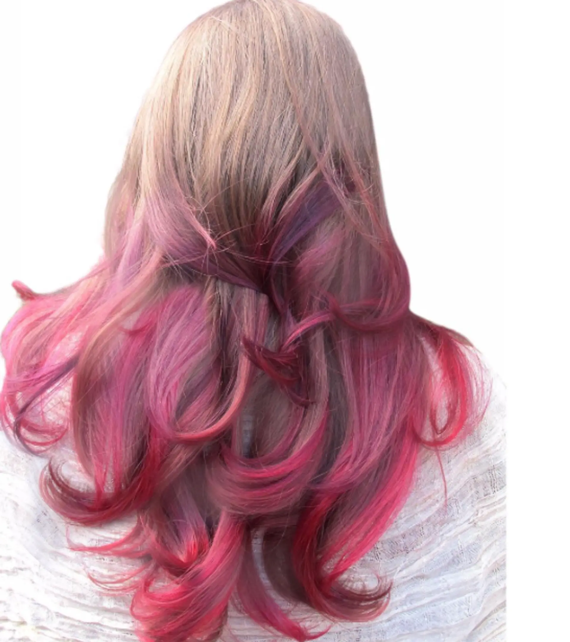 Long wavy hair with a stunning pink and purple ombre or dip dye effect. 1