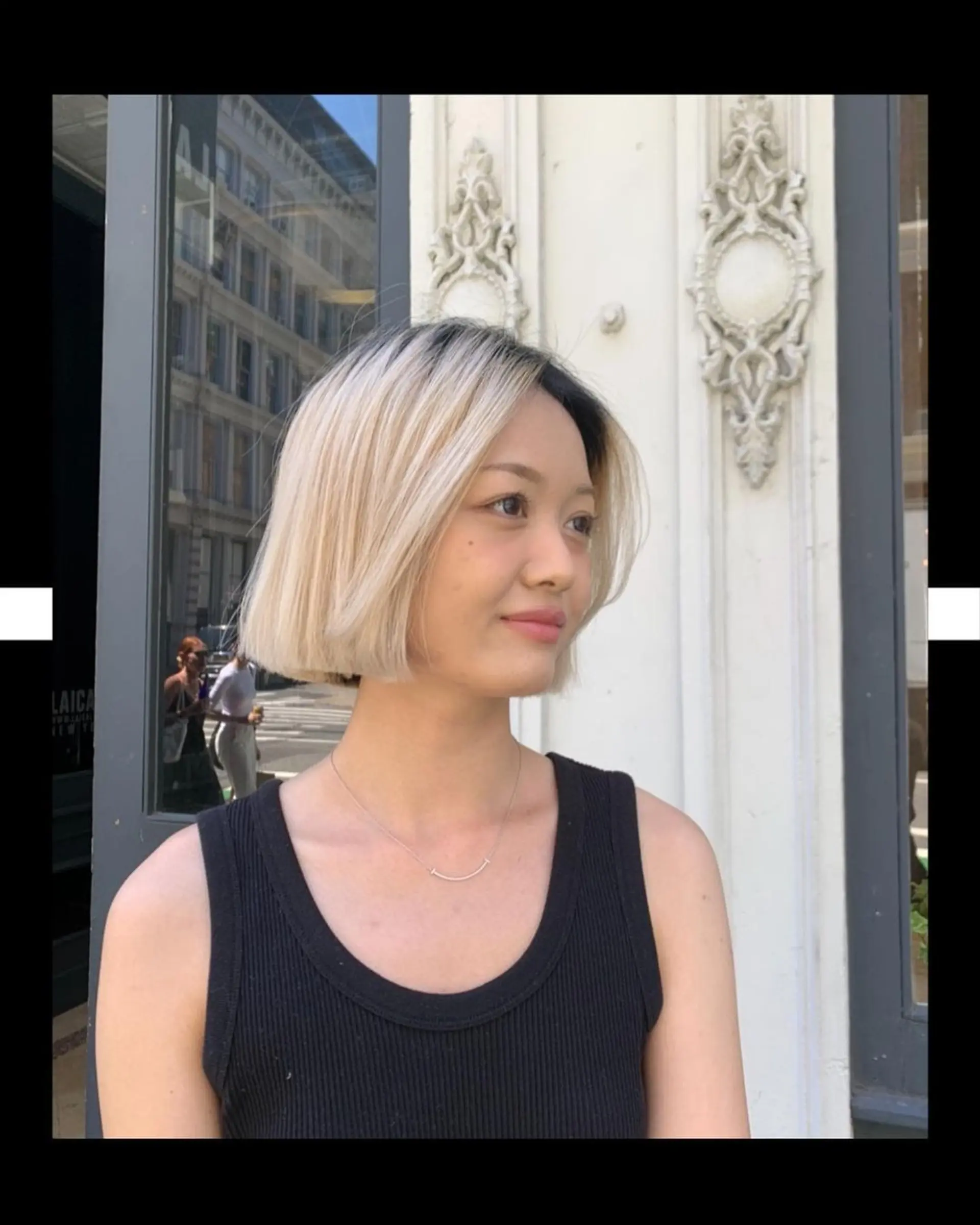 Short, sleek, and straight blunt cut bob in blonde color with a side part, giving a sophisticated and contemporary look. 1