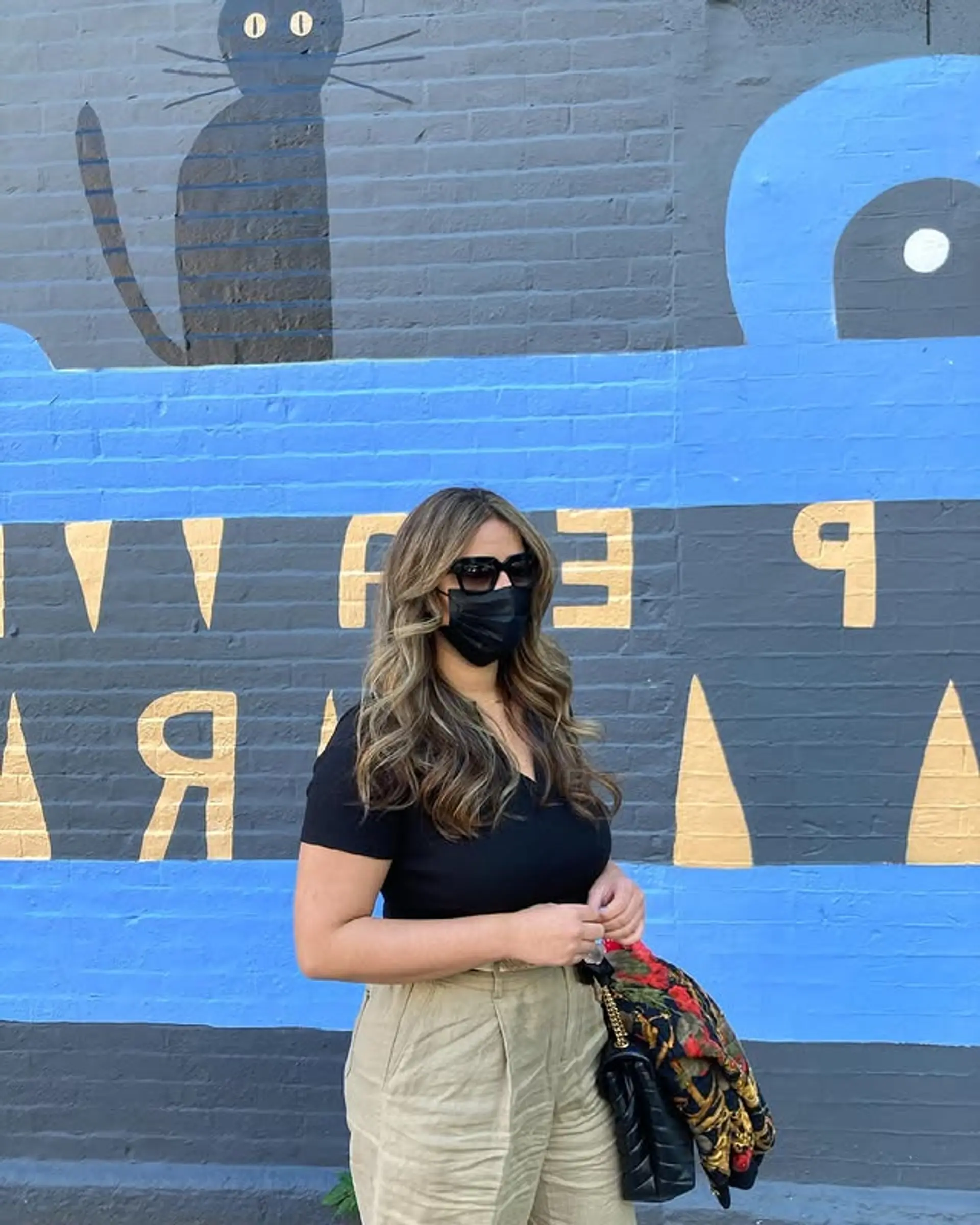 Wavy, medium-length hair with caramel and brown balayage and face-framing layers. 1