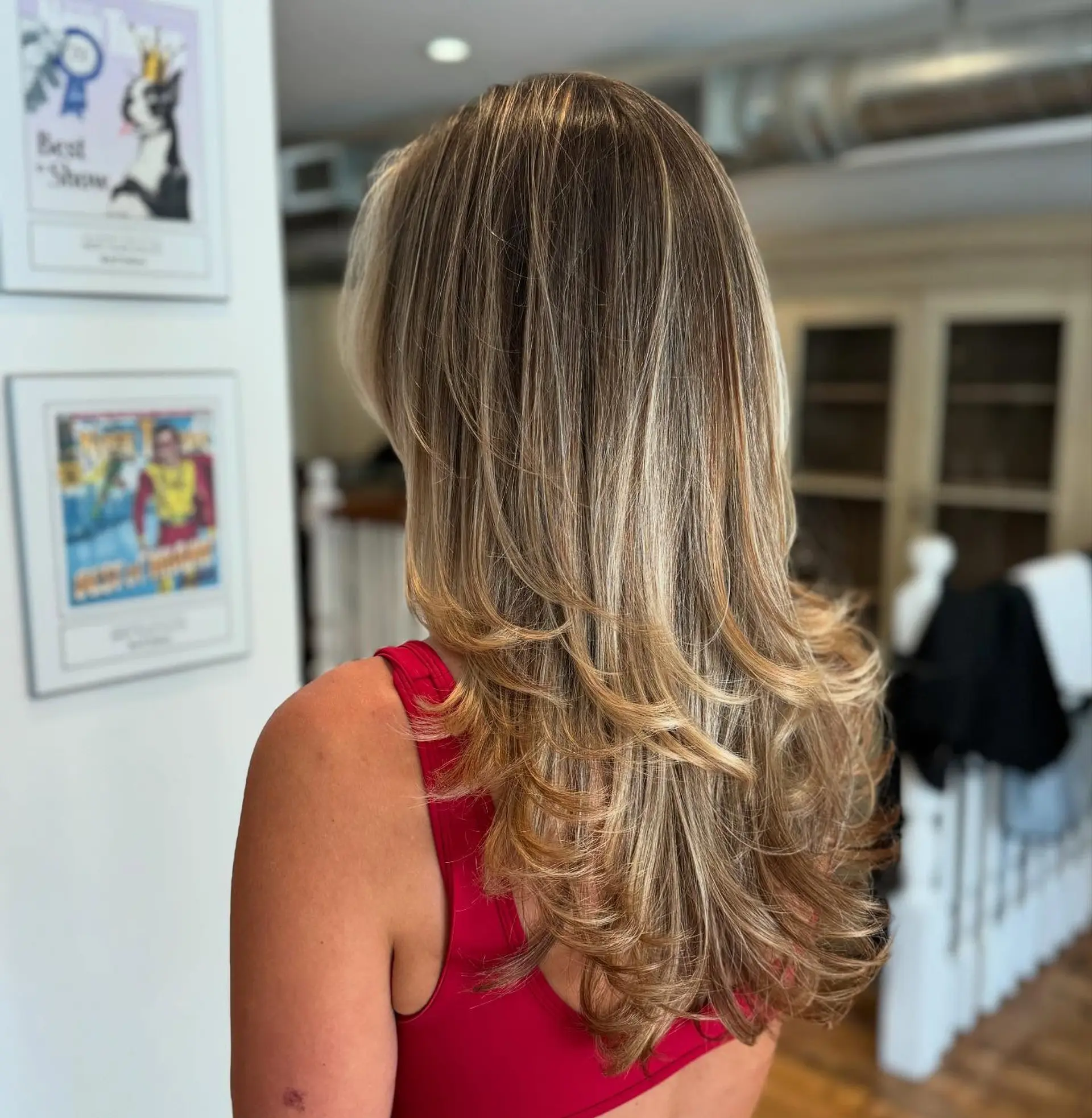 Long layered haircut with a bronde balayage. 2