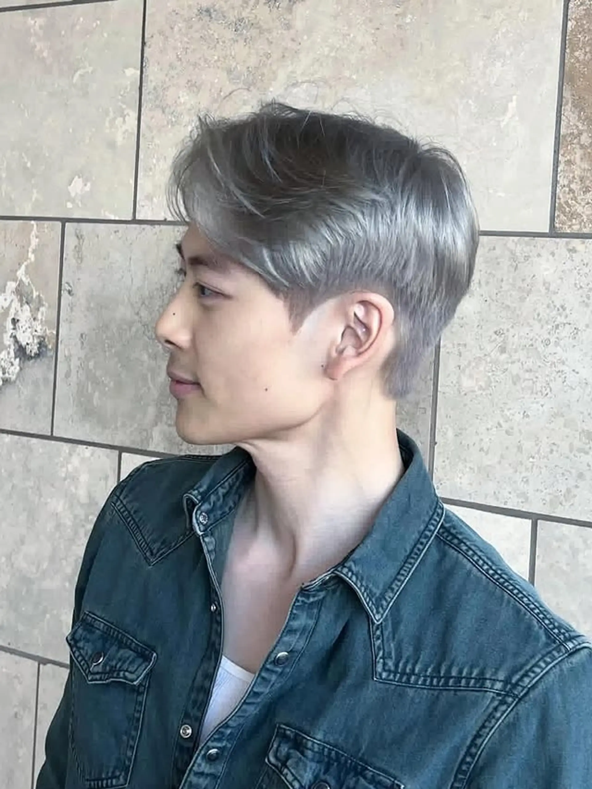 A modern undercut with a textured top and faded sides. 1