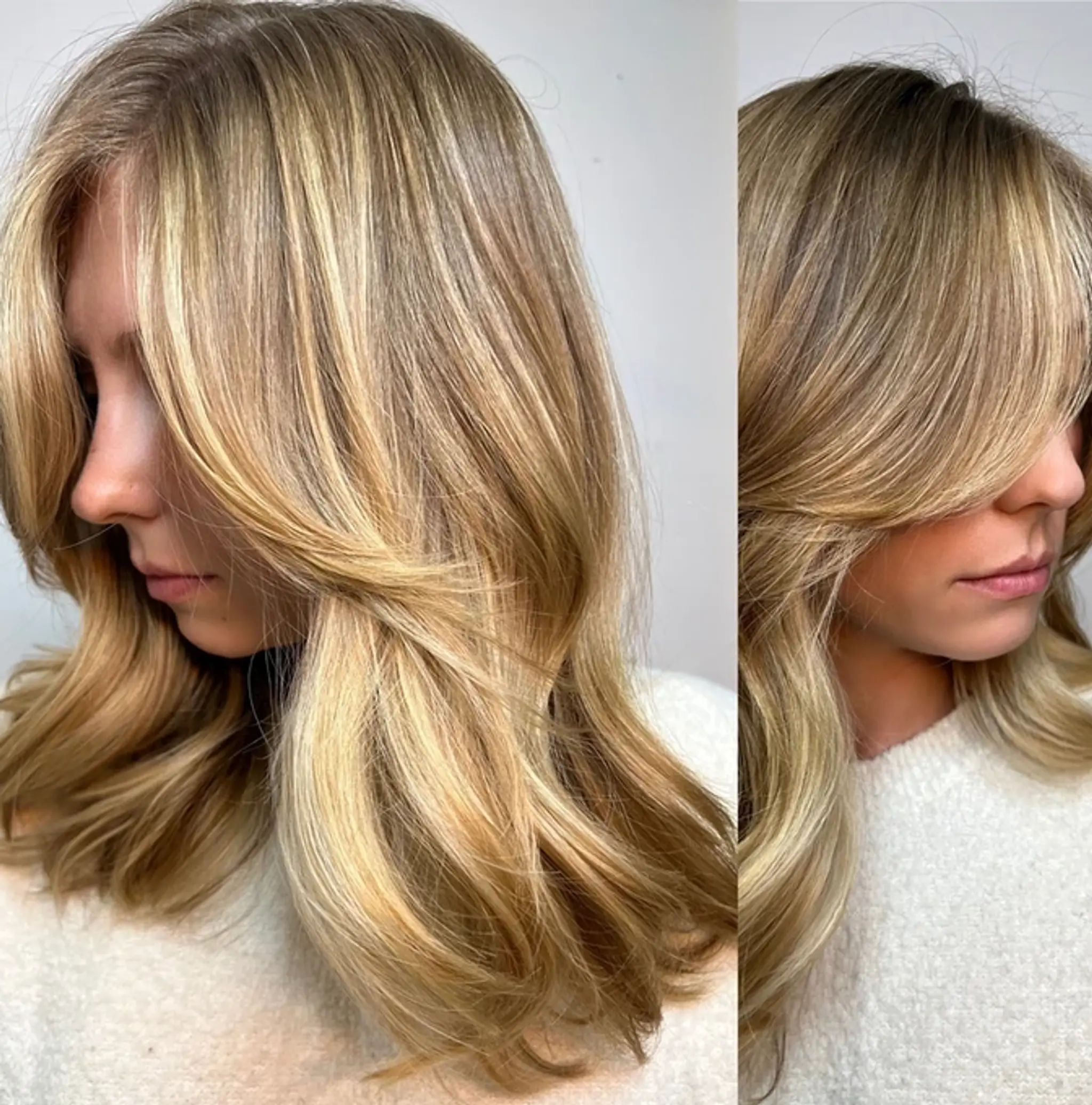 Soft, wavy golden blonde hair with natural-looking highlights and volumizing layers, featuring face-framing strands.