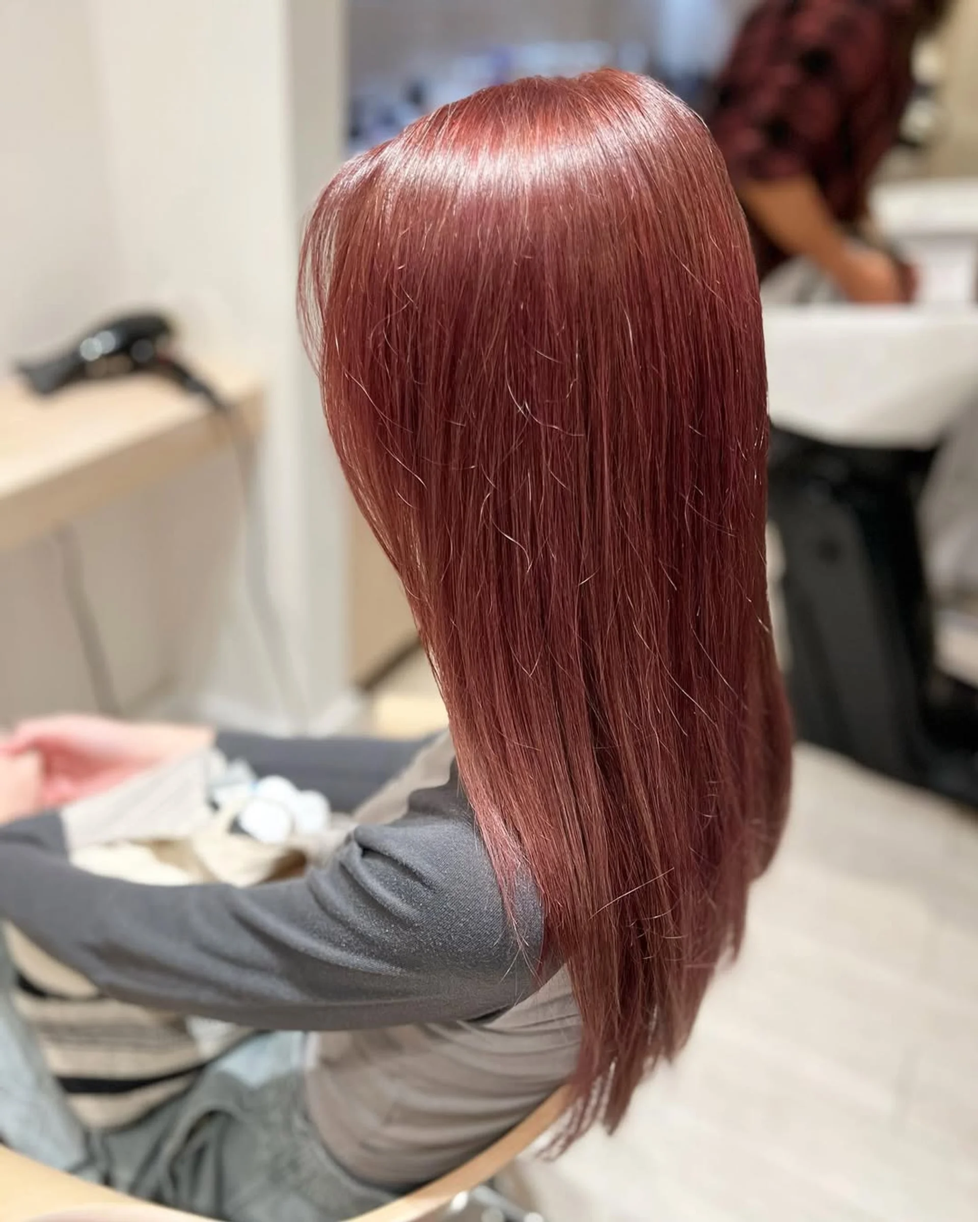 Fiery copper red long wavy hair with side-swept bangs in Manhattan, NYC - Preview 2
