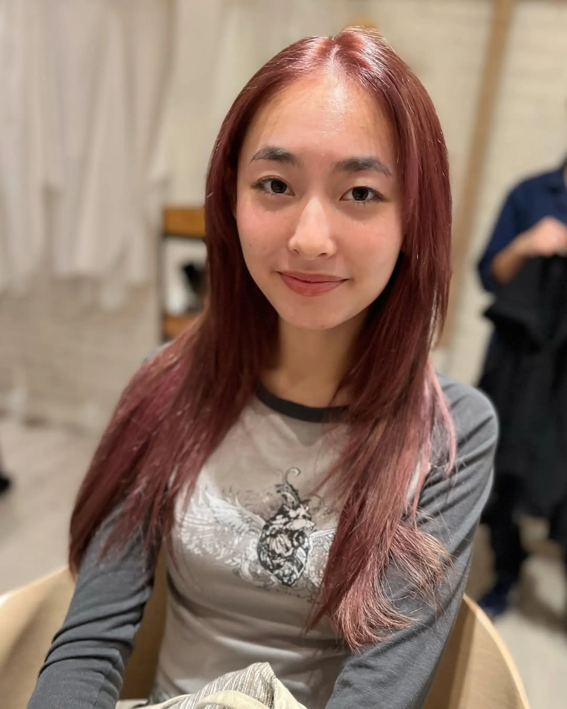 Long, straight hair with a vibrant auburn copper color. 2