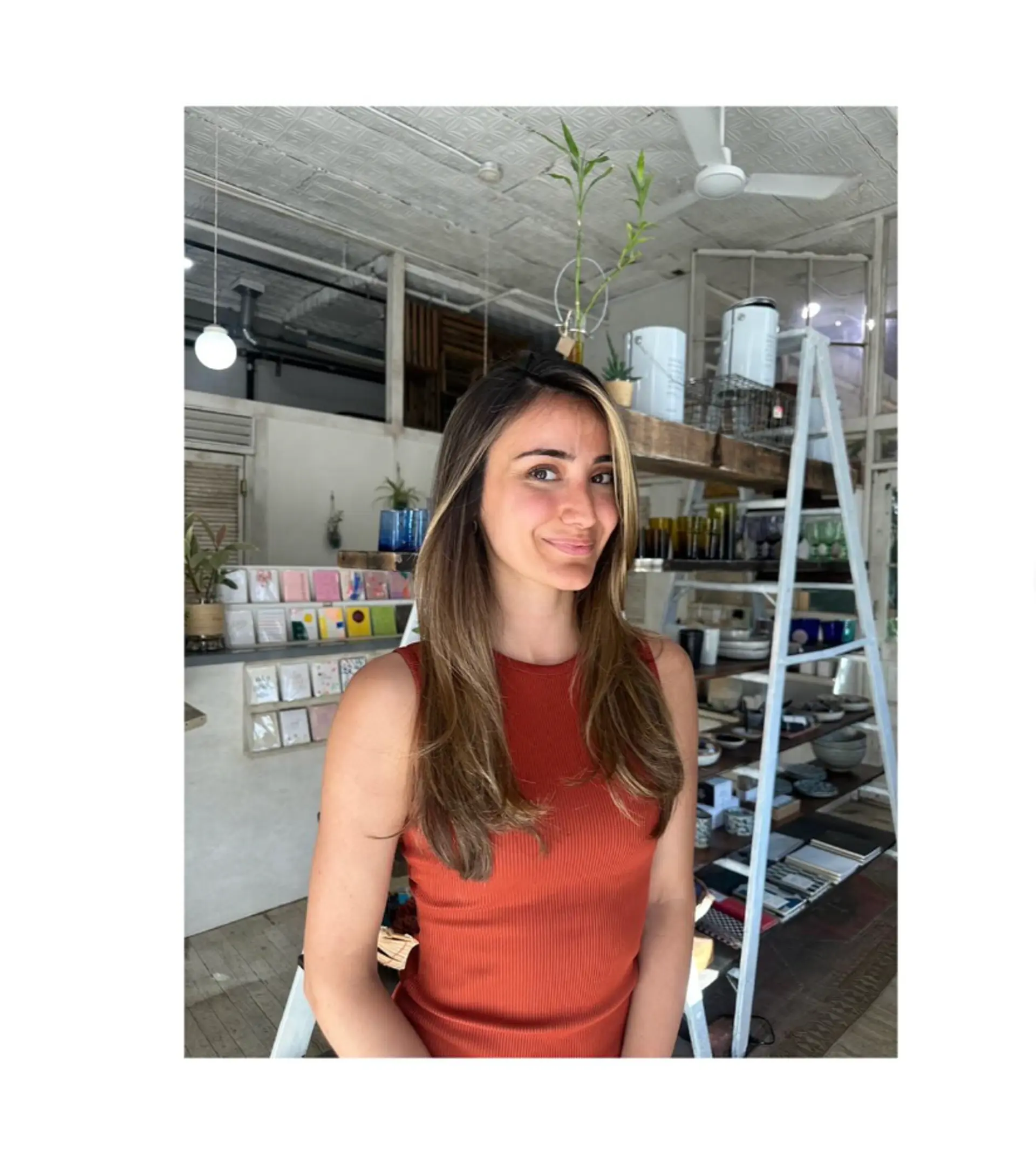 Layered medium length brunette hairstyle with subtle blonde balayage. 1