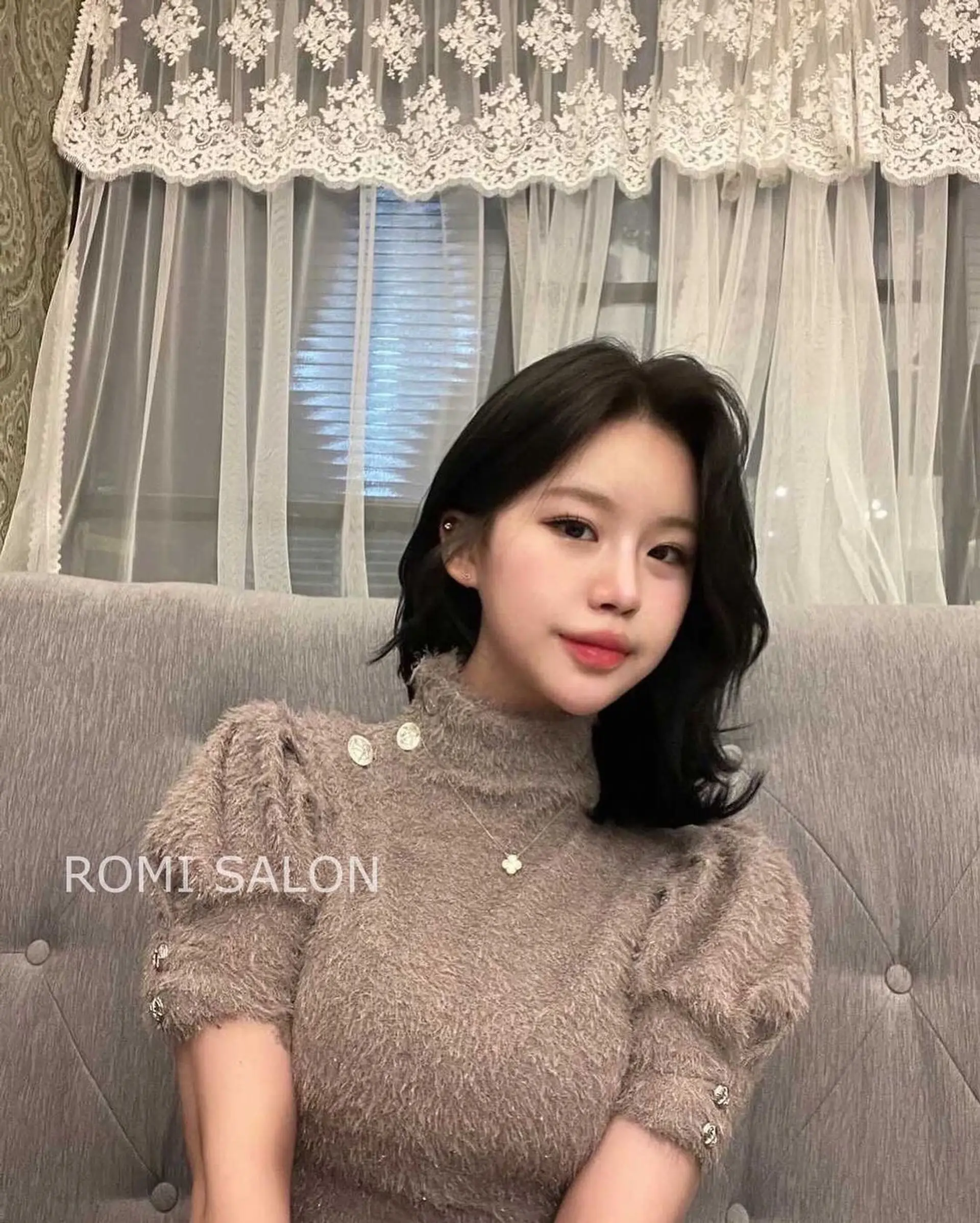 A chic and modern wavy bob with soft, shoulder-length waves. 1