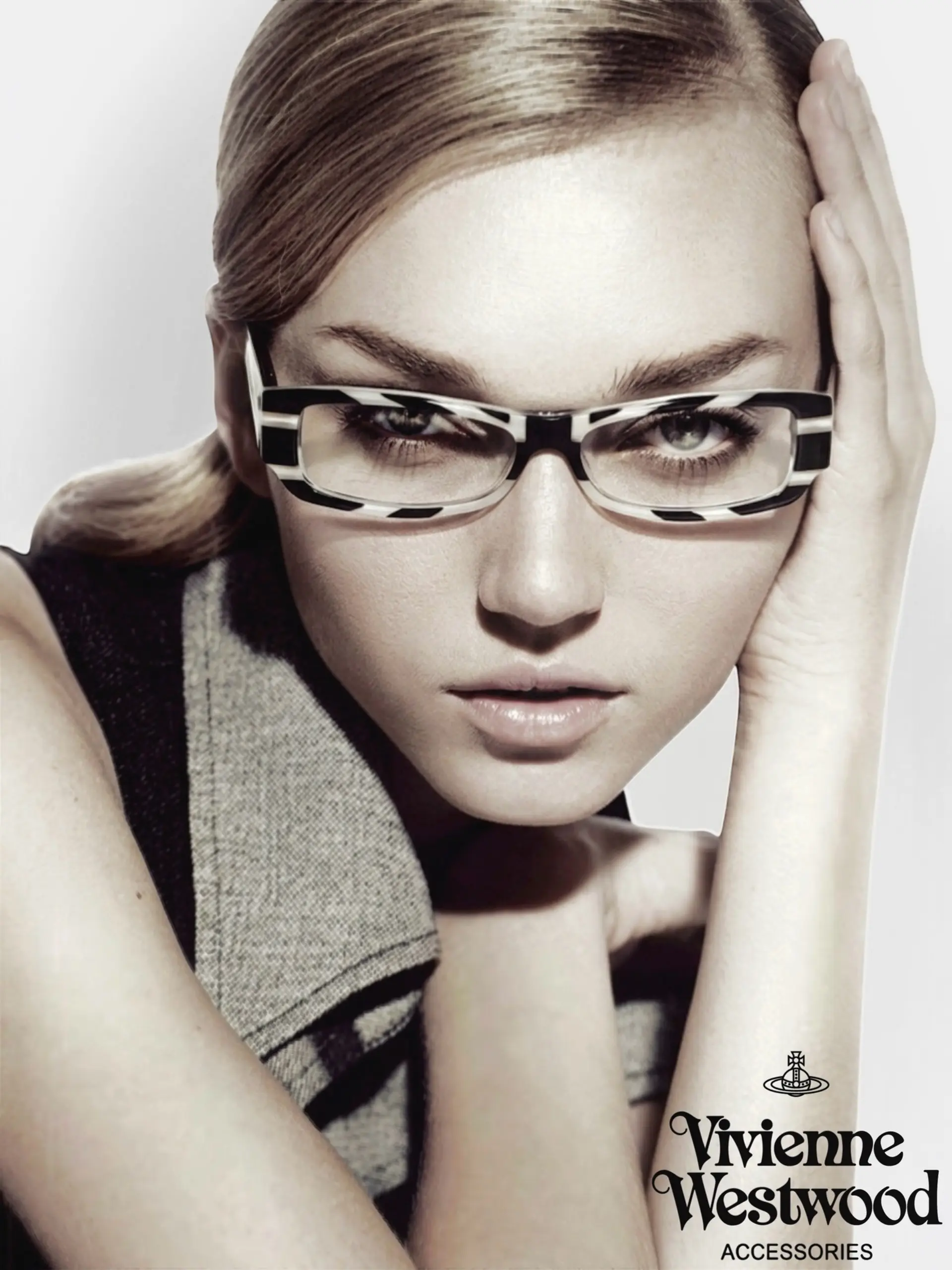 A smooth, side-parted low ponytail with a sleek finish. 1