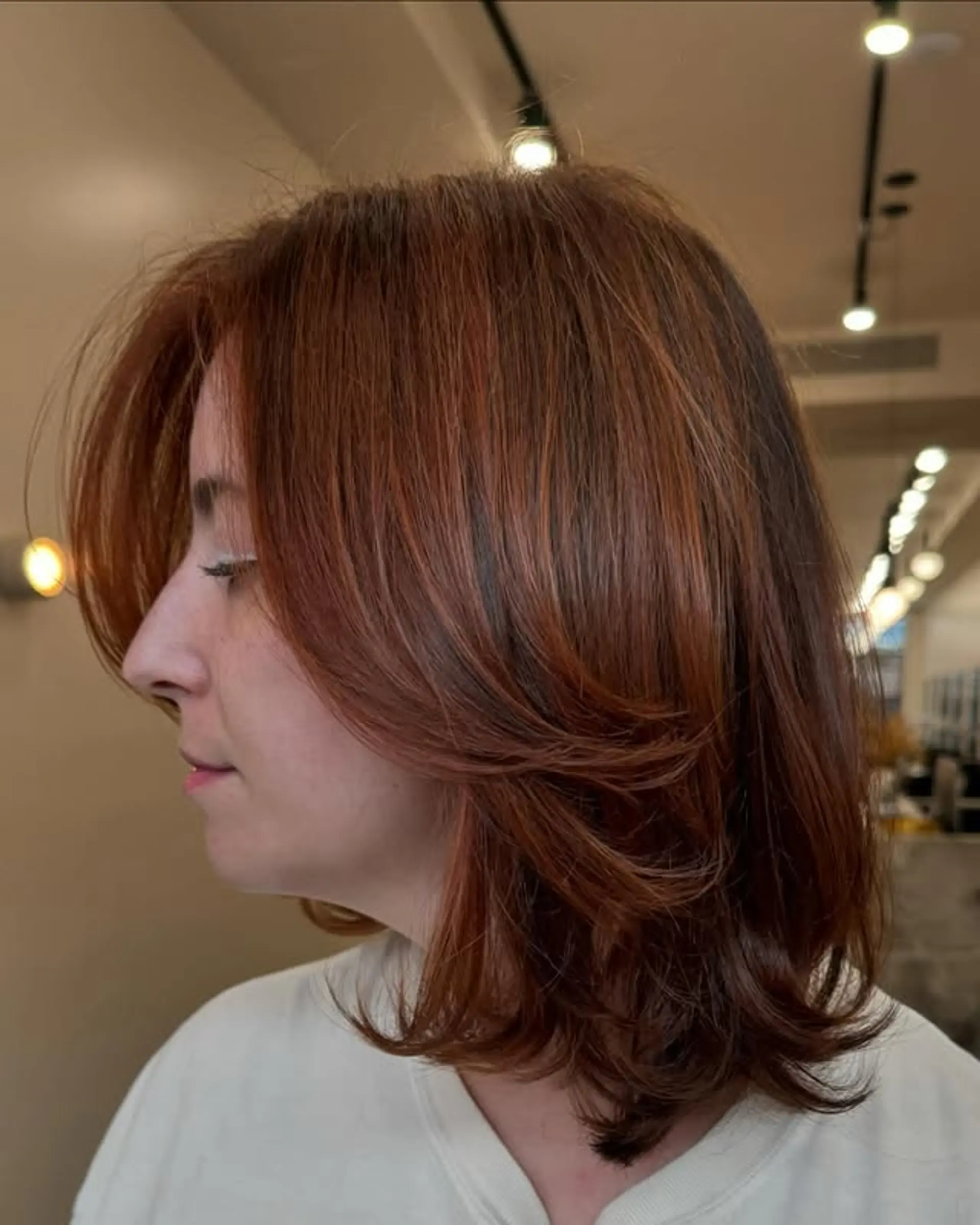 A layered bob with soft, face-framing layers. 1