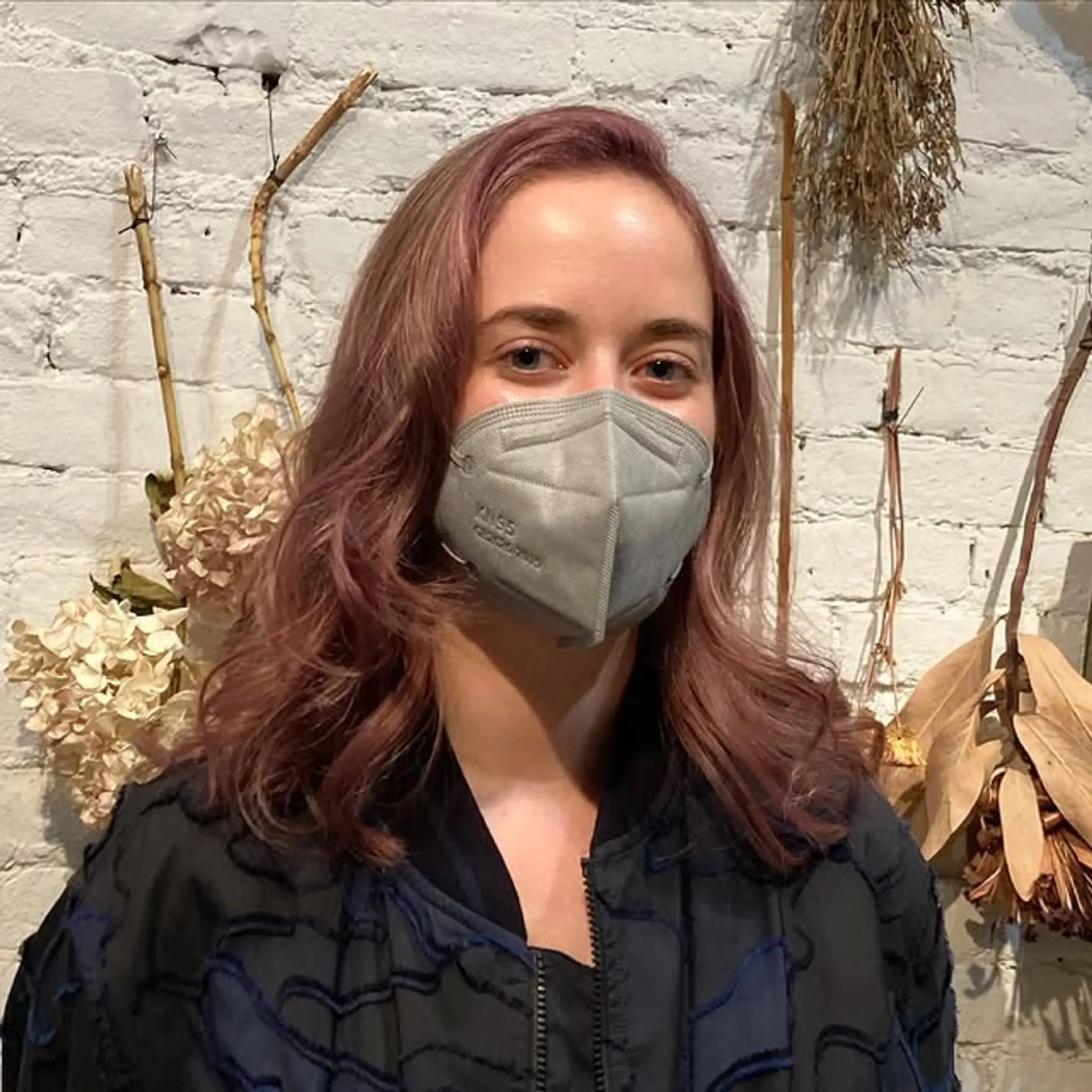 A medium-length wavy lob with a dusty rose color. 1