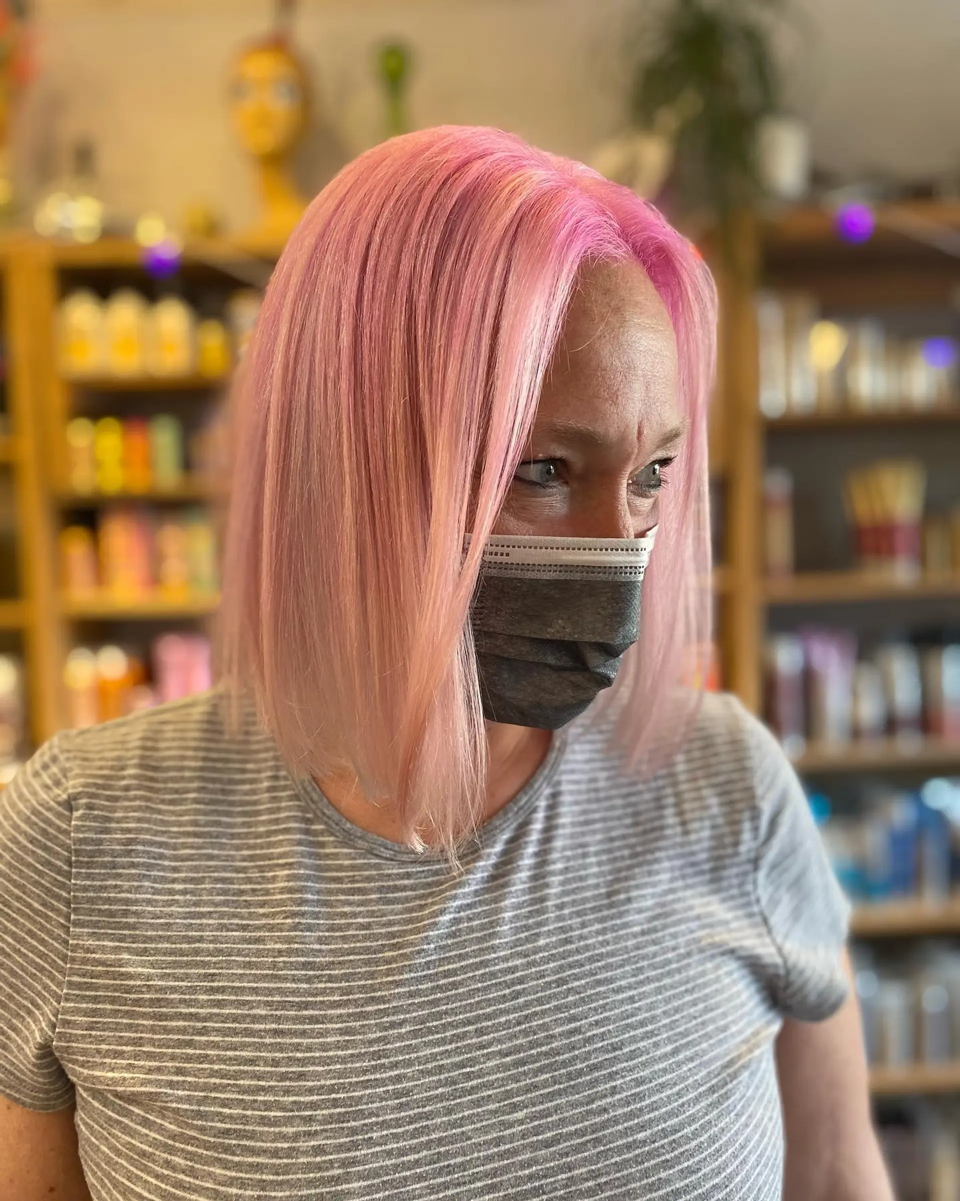 A straight blunt bob, dyed a trendy Millennial Pink. 1