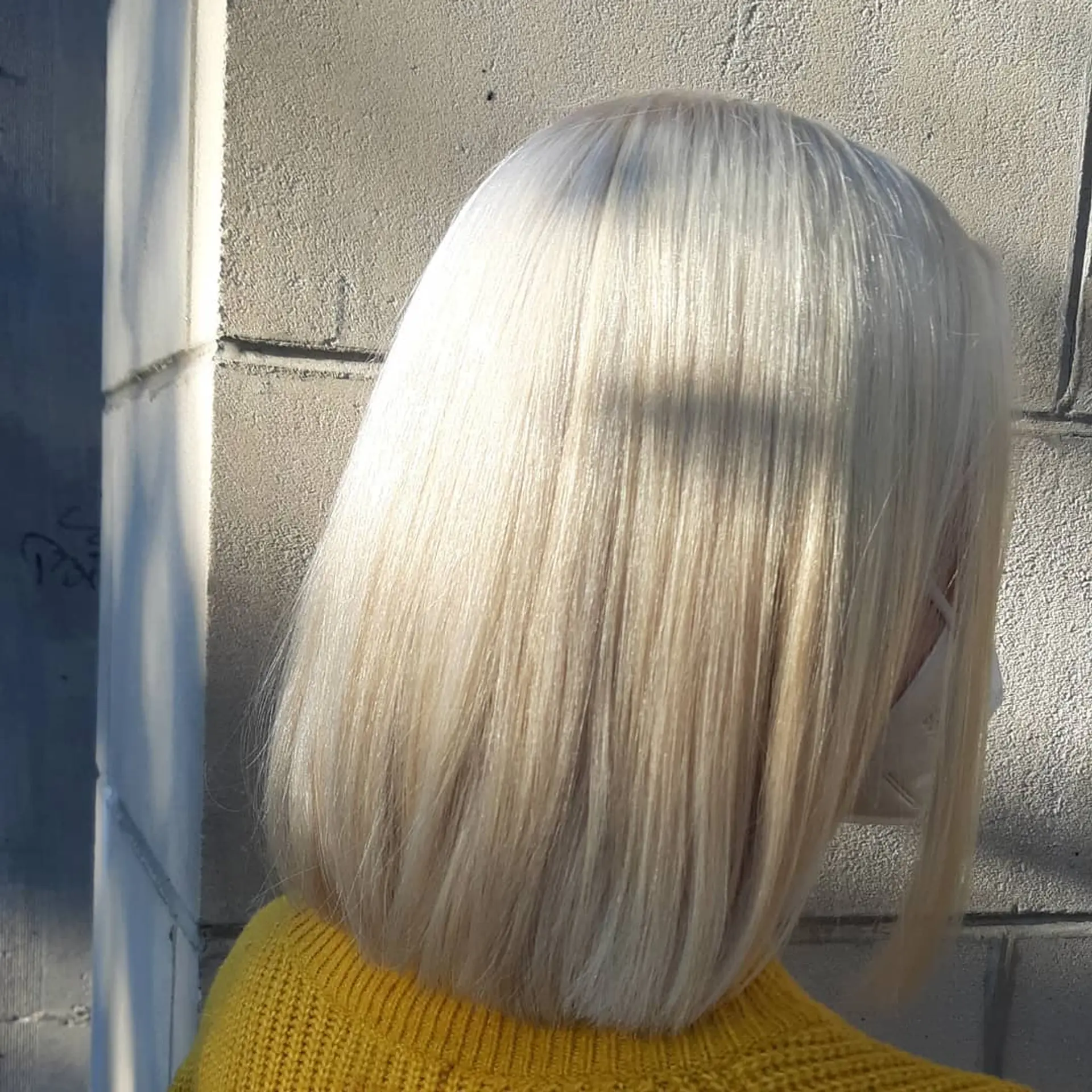 A sharp, straight blunt bob with a modern, cool edge. 2
