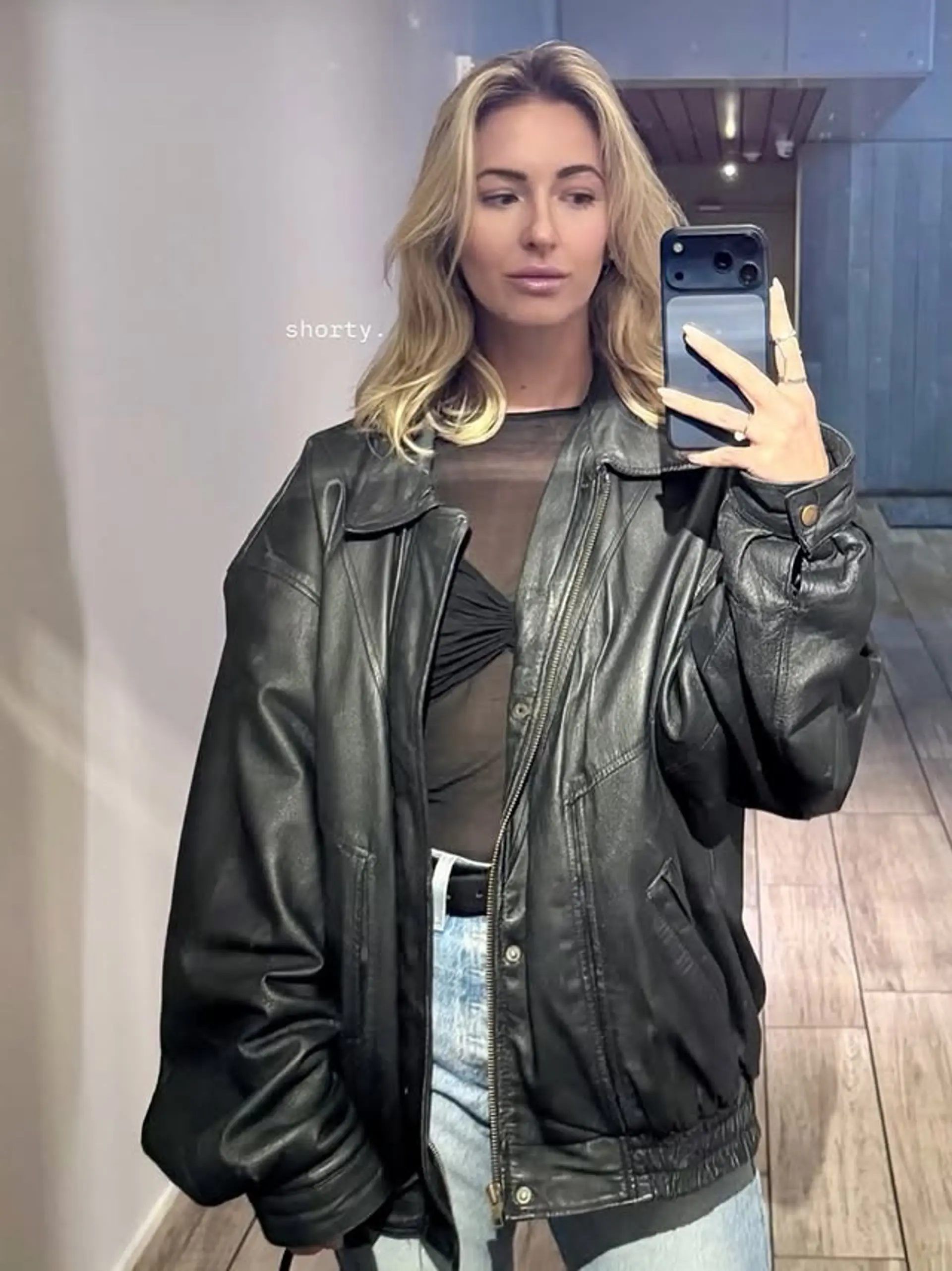 A medium-length wavy hairstyle with beachy waves and subtle layers. 1