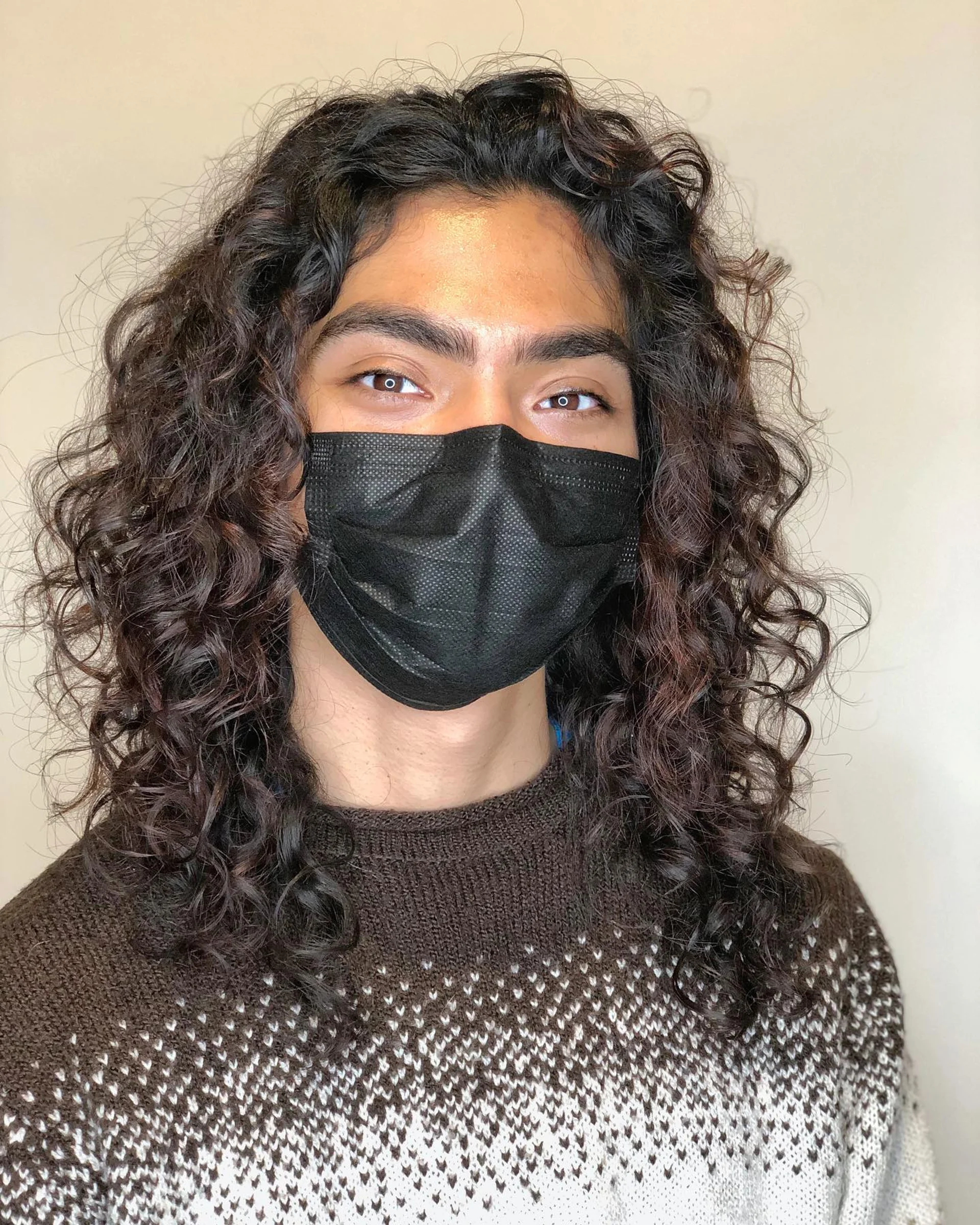 Long layered haircut with face-framing layers to add dimension and movement - Preview 1