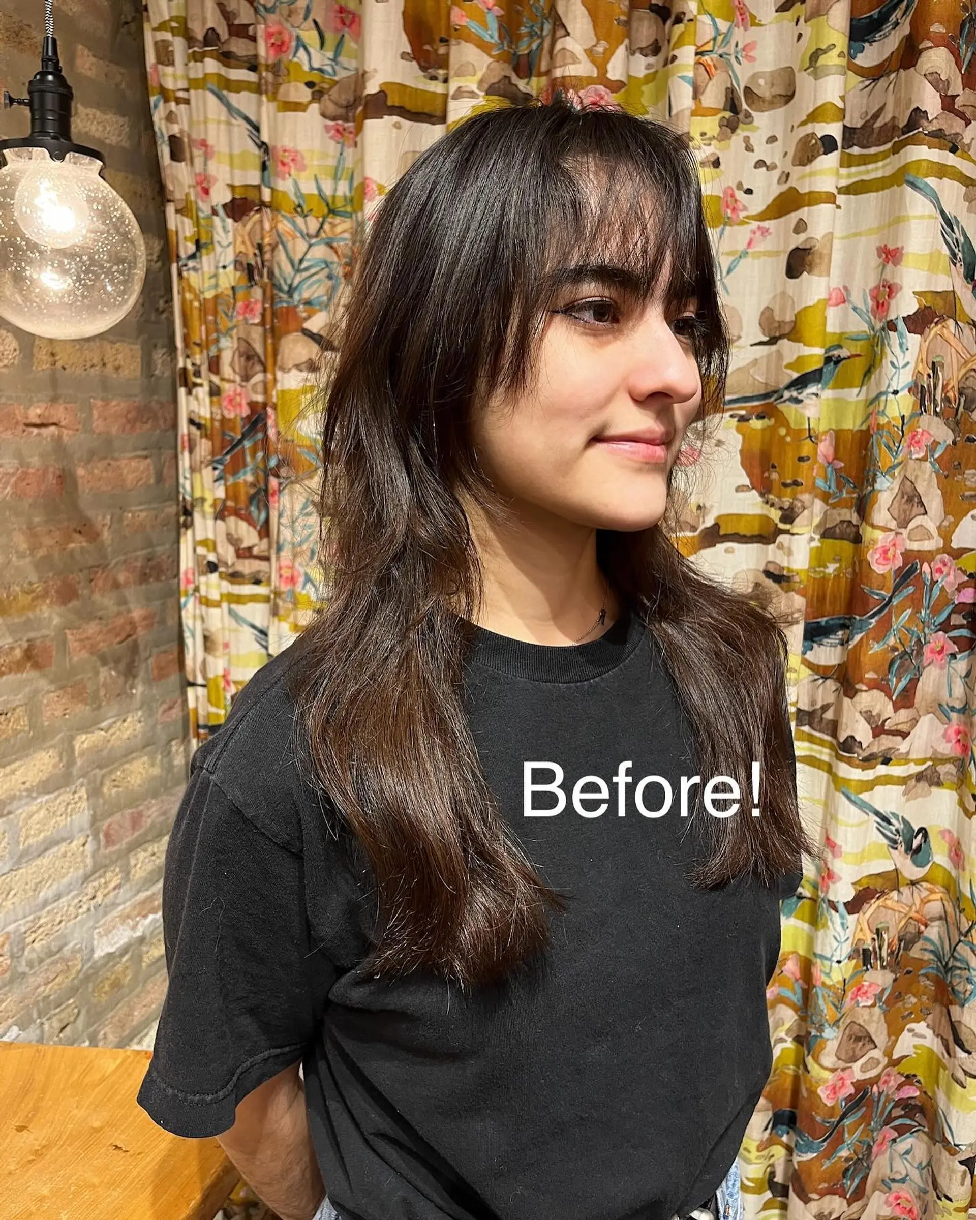 A modern shag mullet with choppy layers and short baby bangs. 3