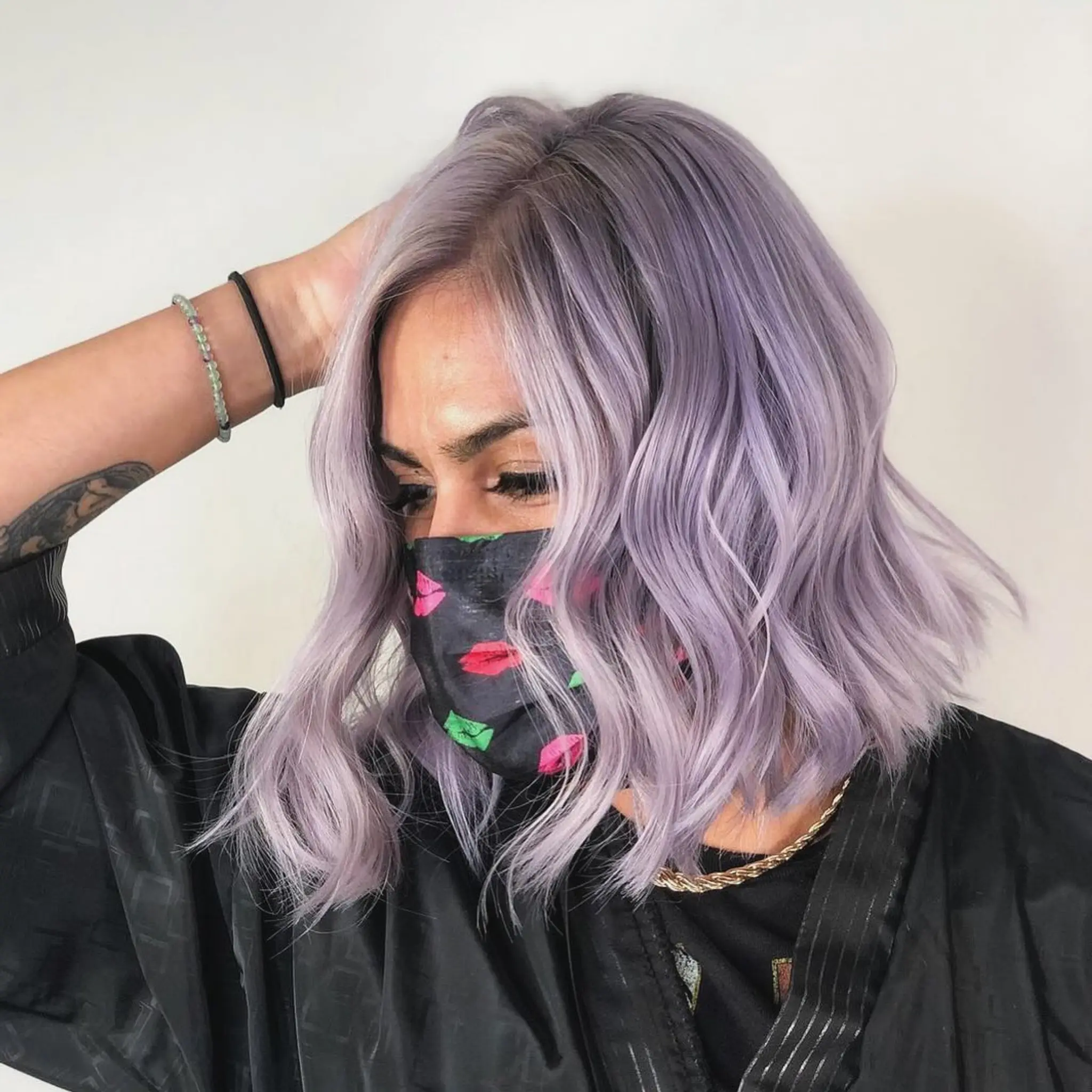 Medium-length wavy lavender hair, center-parted with a soft pastel hue.
Stylist - @xcellent_jason