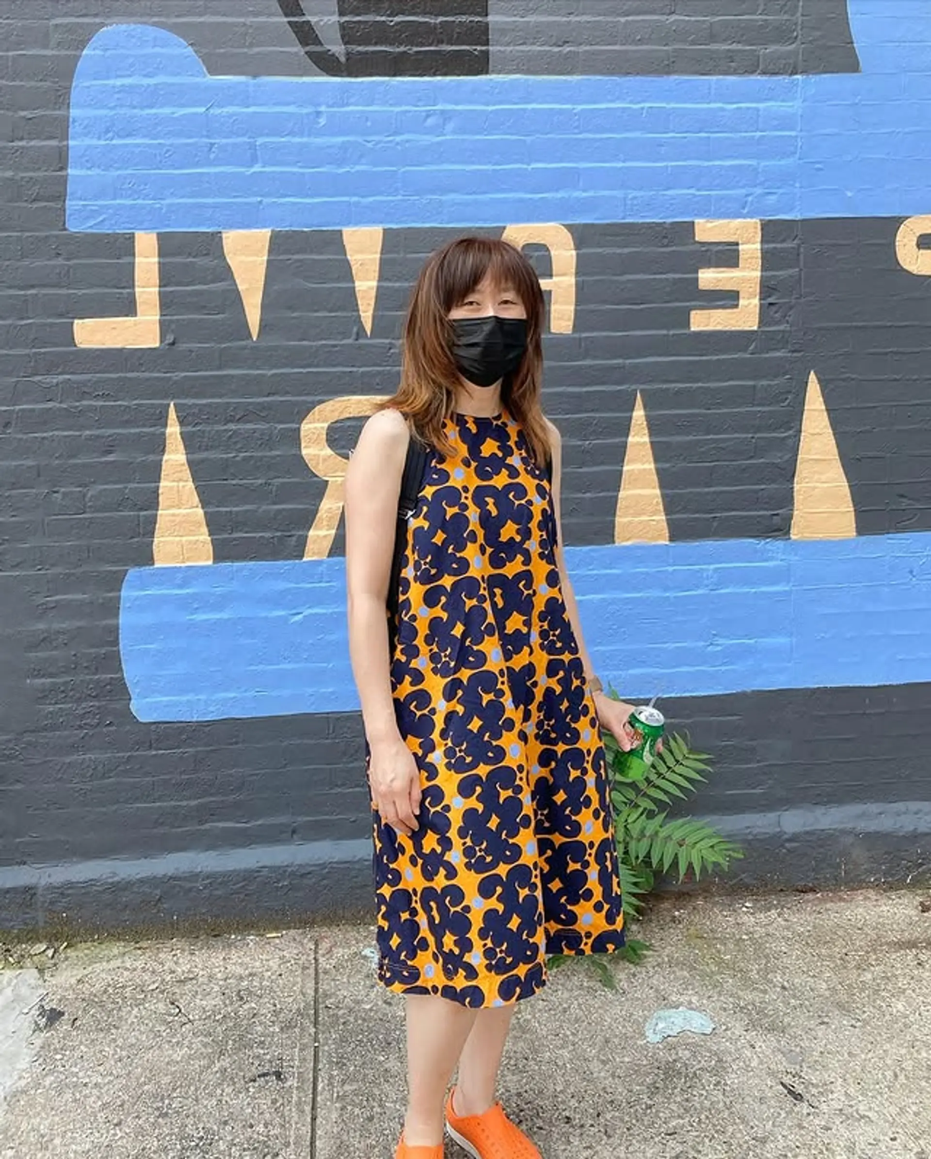 A medium-length shag haircut with feathered layers and soft curtain bangs. 1