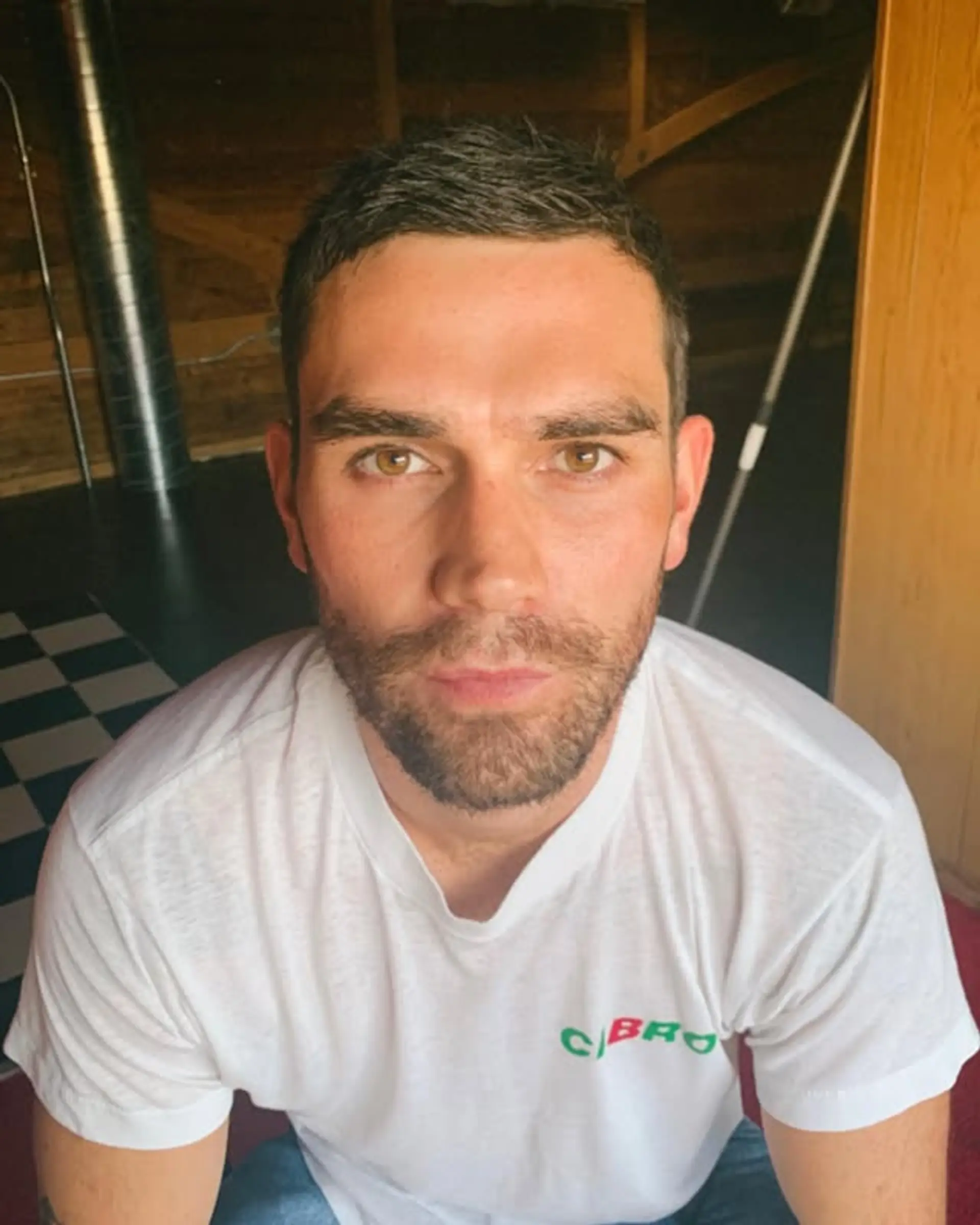 A stylish 'Bro Flow' haircut with tapered sides and a slightly longer top. 1