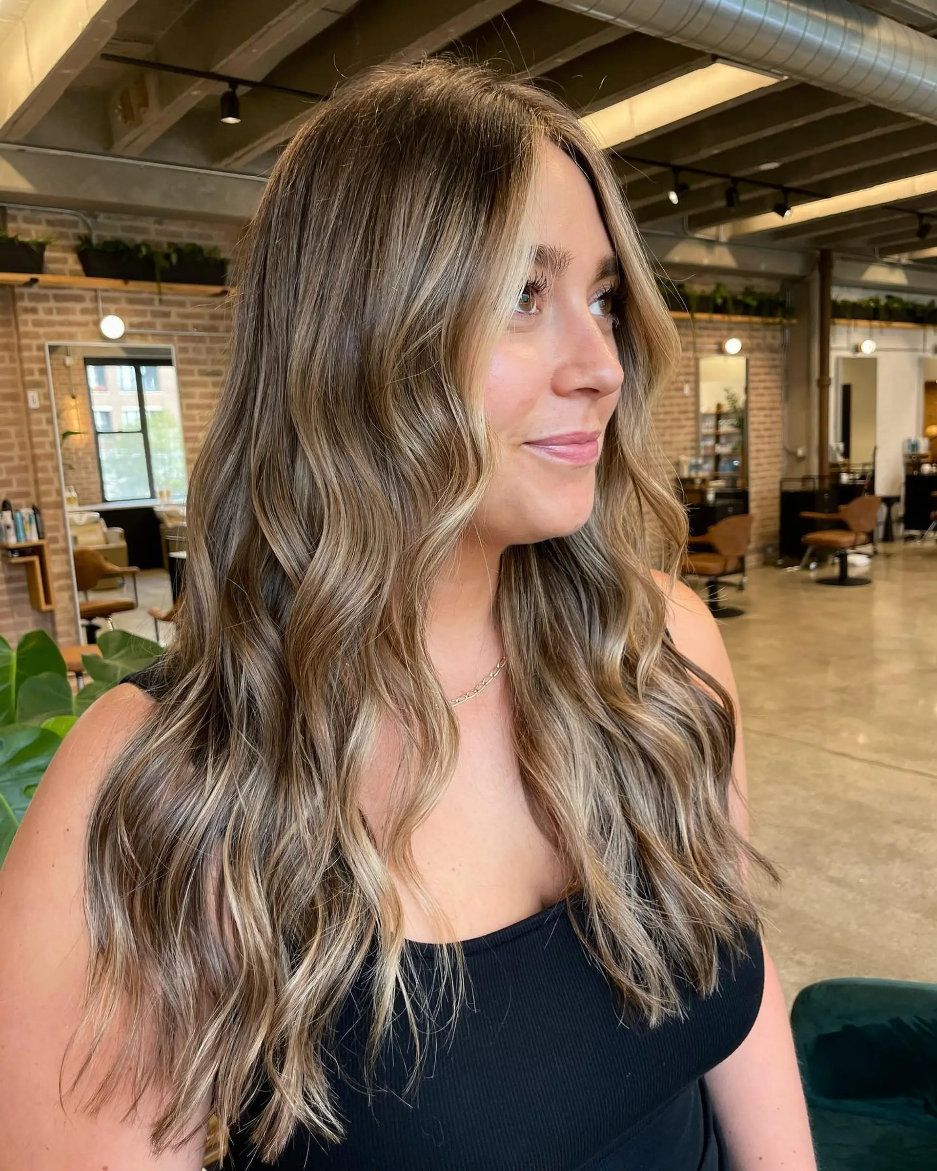 Long, wavy hair with a caramel balayage. 1