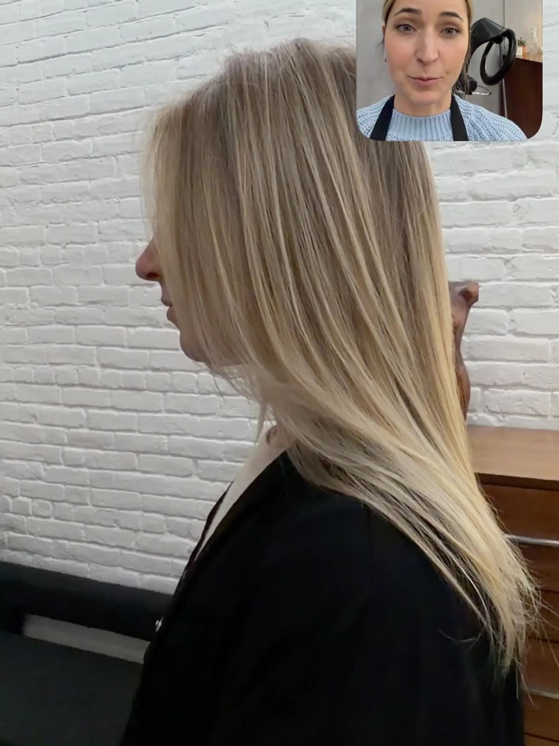 Long, sleek straight hair enhanced with soft dimensional blonde highlights. 1