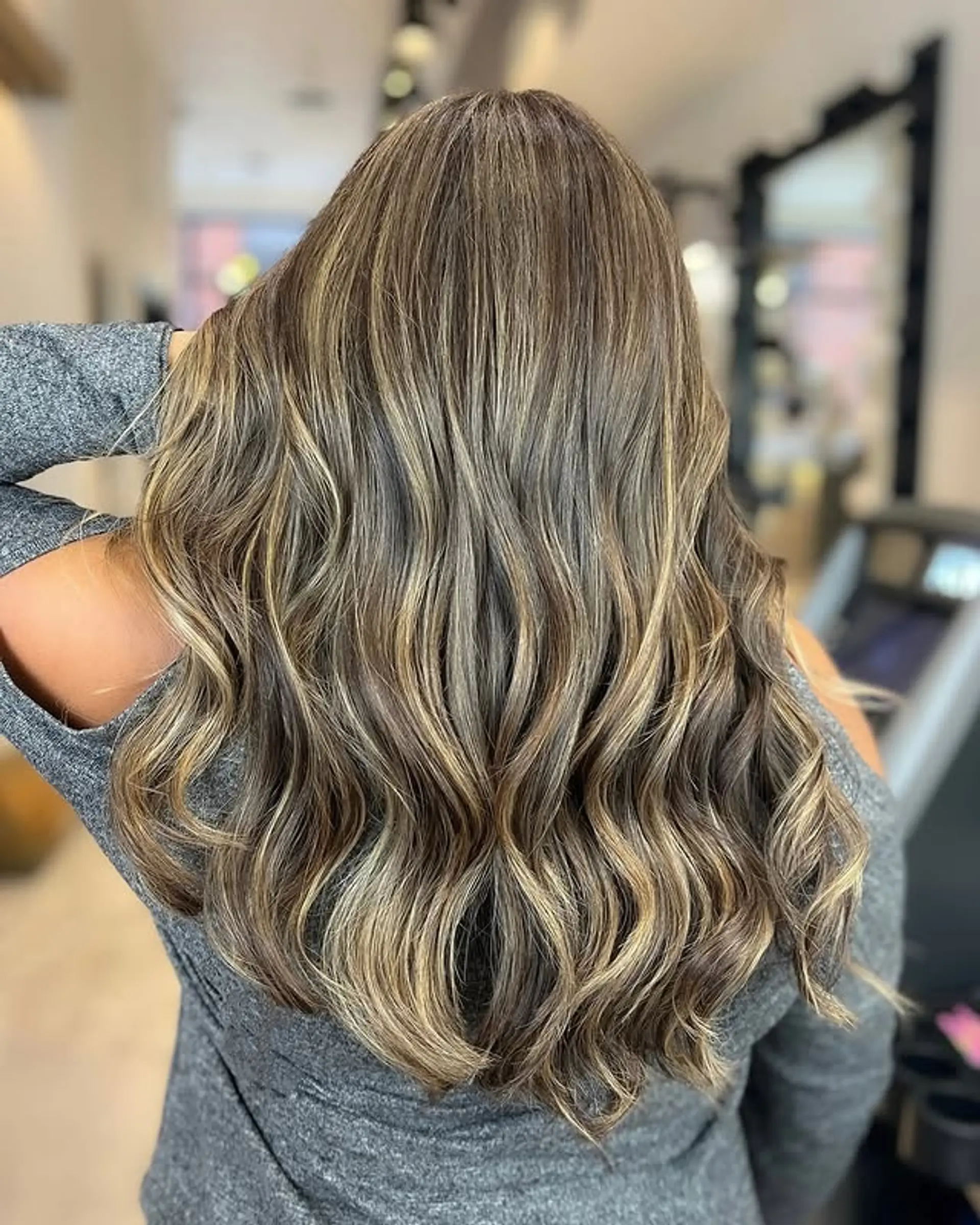 A bronde balayage with long, wavy layers for a dimensional and trendy look. 1