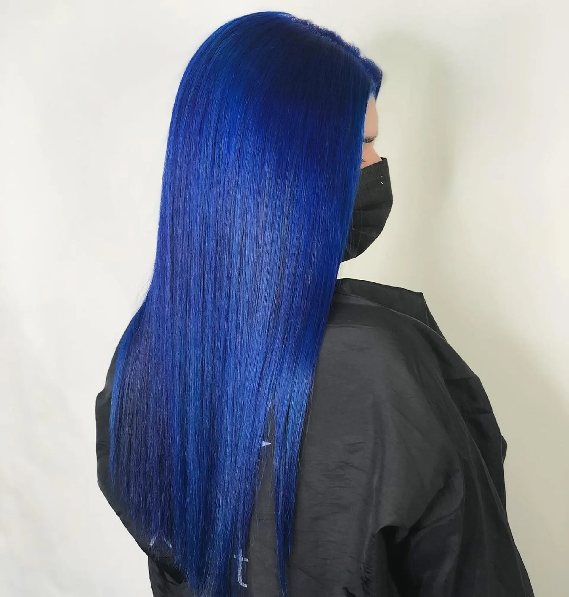 A vivid, electric blue long hairstyle with sleek and straight texture, offering a bold and edgy look.
Stylist - @xcellent_jason 1
