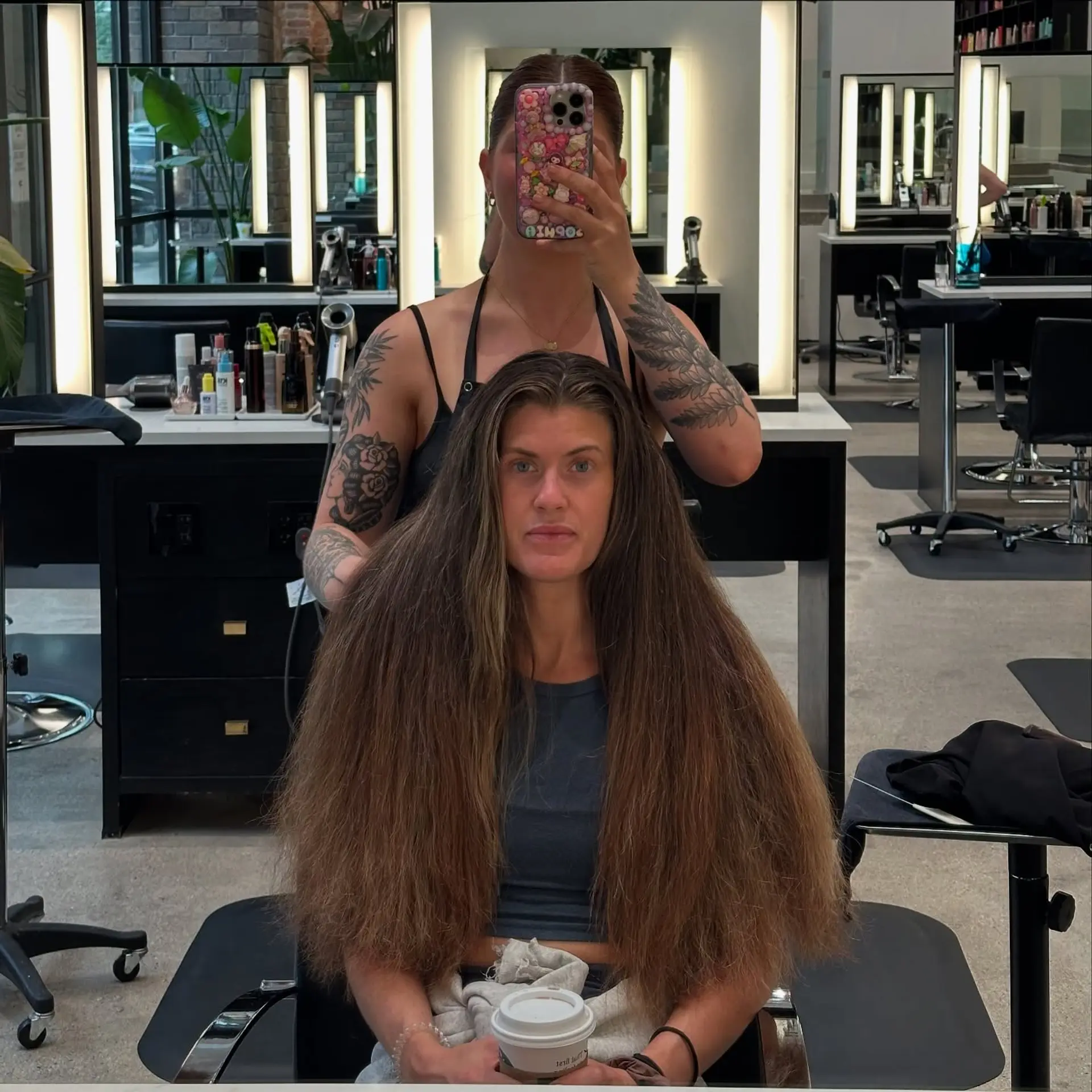 Long layered hairstyle with an ash blonde balayage. 2