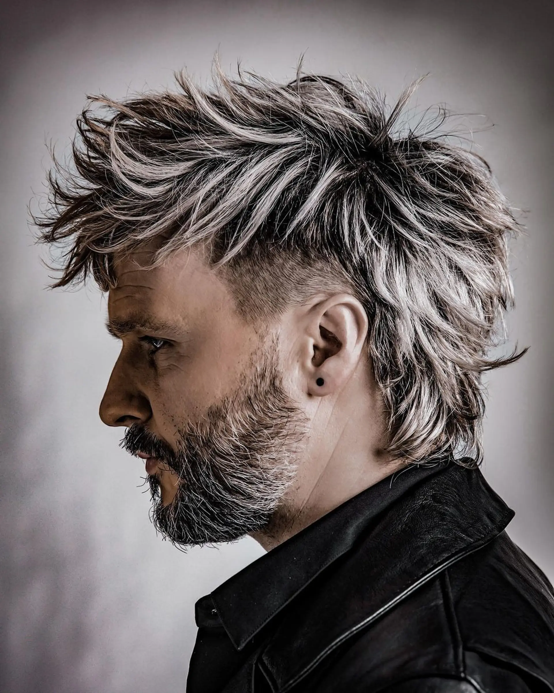 Modern take on rocker mullet—very Keifer Sutherland-esque in his late 80’s vampire classic.

Model: Chris Maguire
Photographer: William Yan
Wardrobe: Keith Pearson
Makeup: Mariah Callahan
Color: Taylor Tedeschi 1