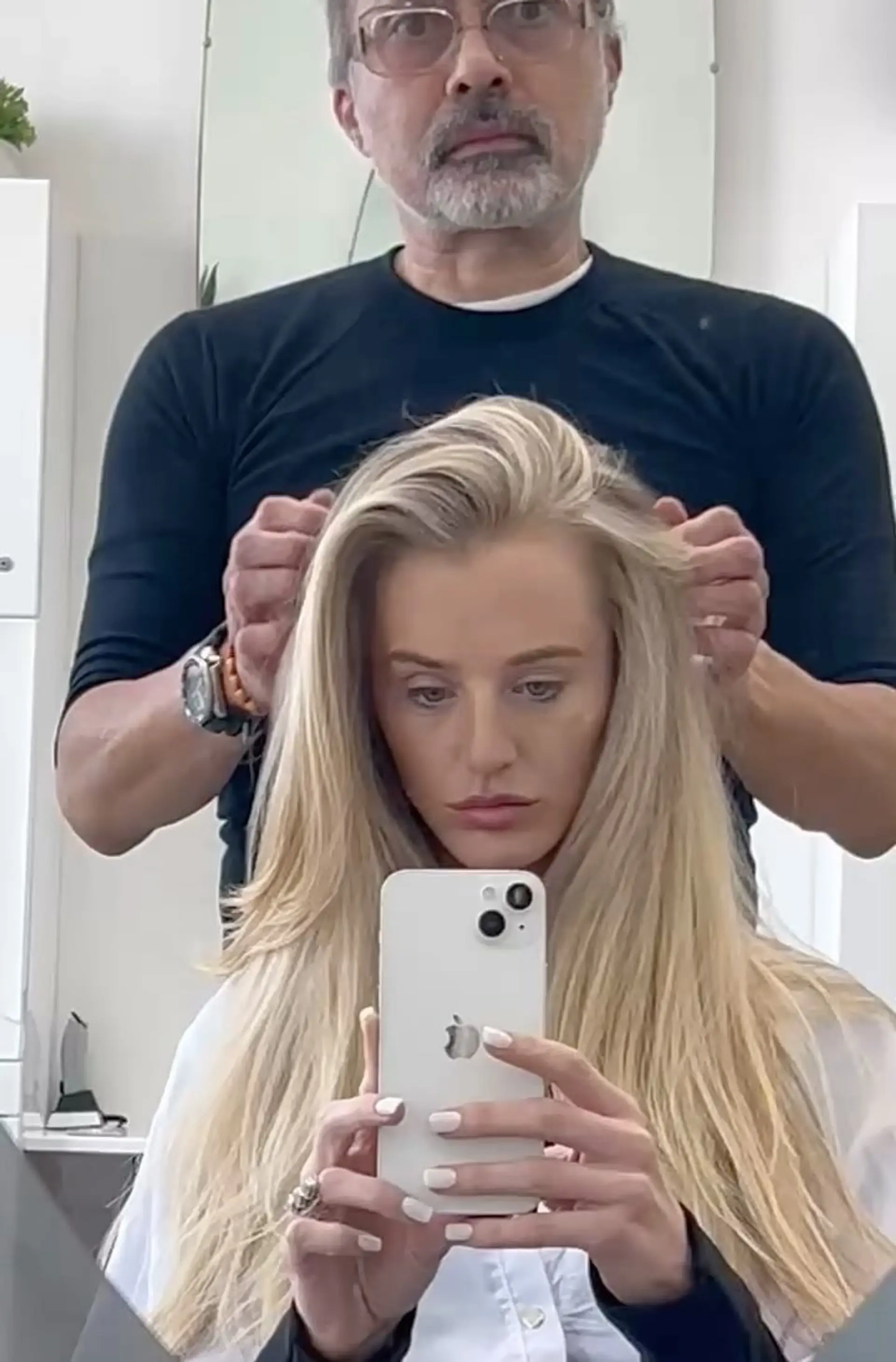 Long, flowing bright blonde hair styled with soft layers and root lift. 1