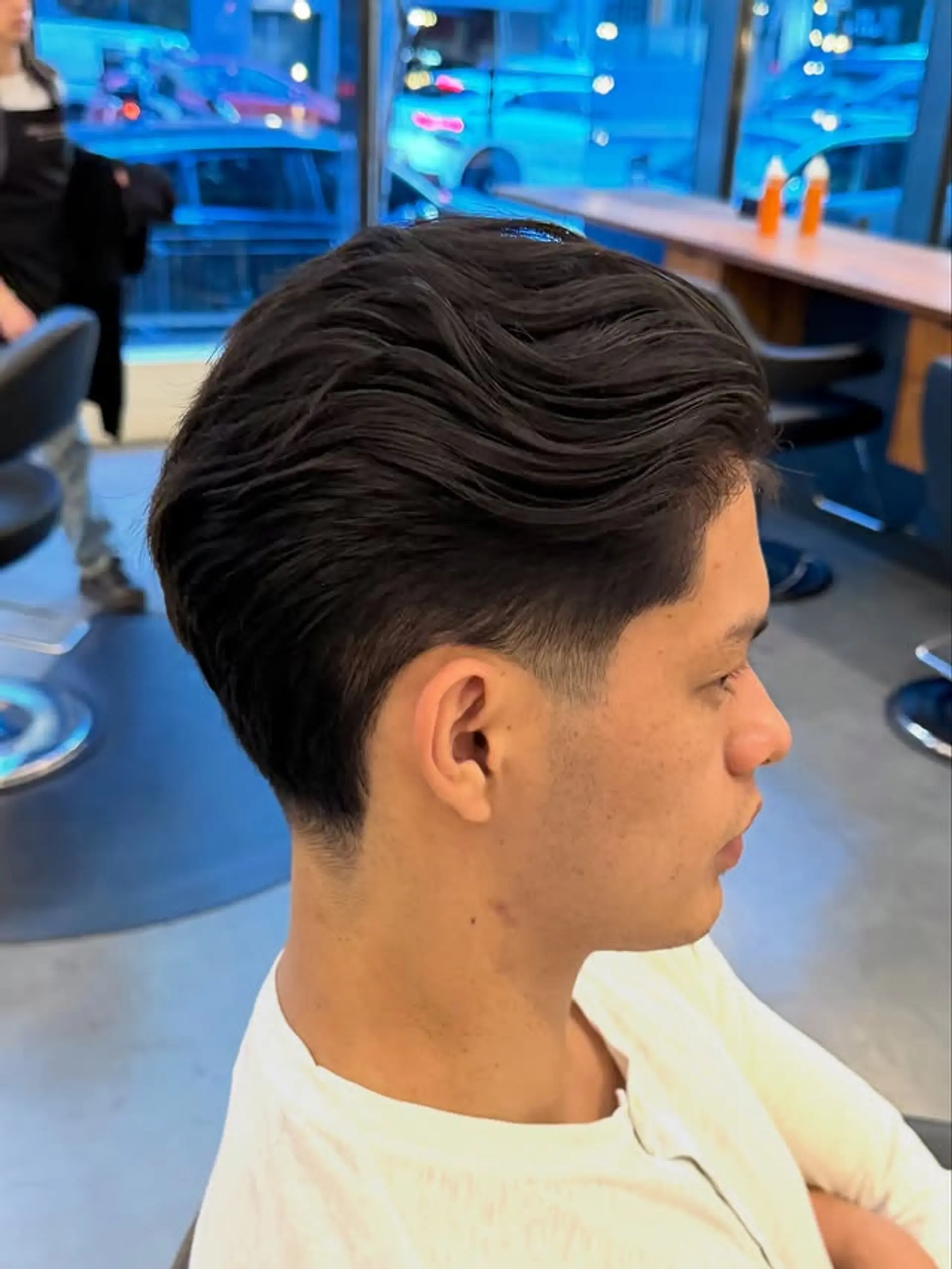 A stylish medium-length comb over with a modern taper fade. 1