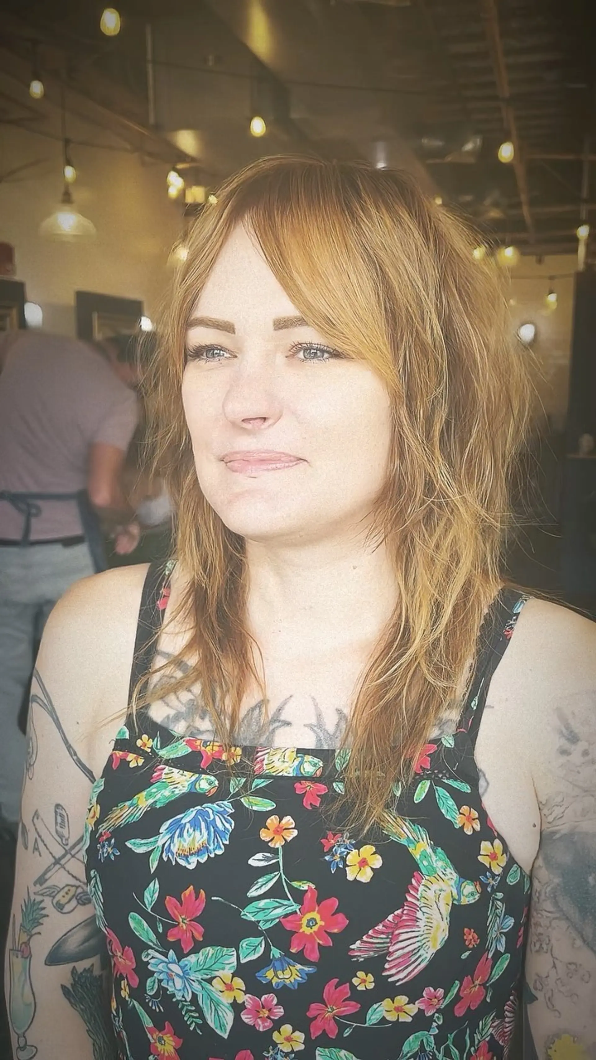 A medium-length razored modern shag haircut featuring textured, piecey layers and soft curtain-style fringe. 1