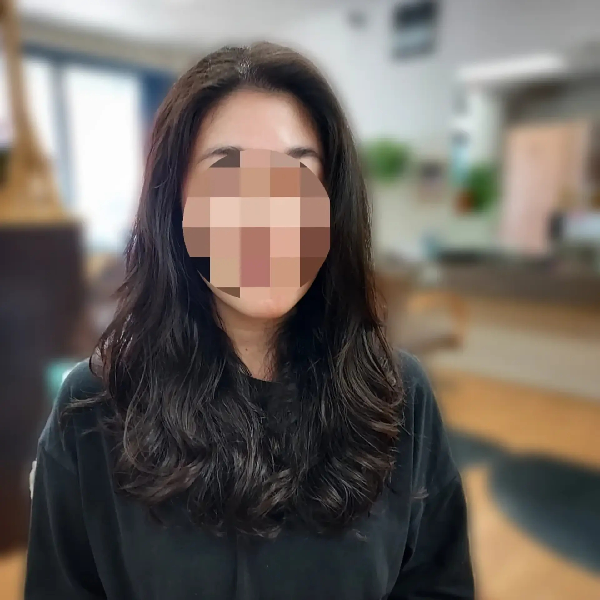 Long dark hair styled with soft, voluminous digital perm waves and face-framing layers. 1