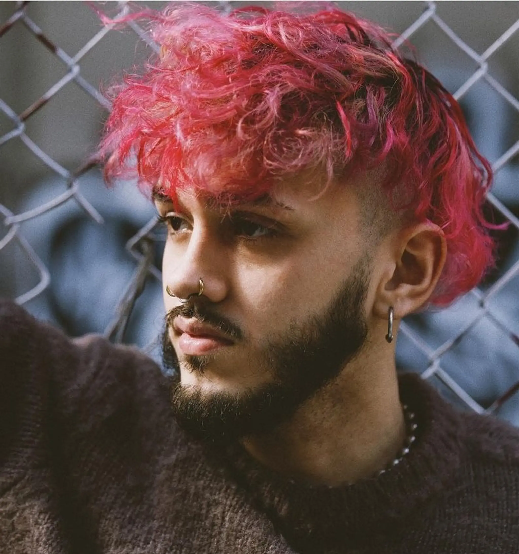 An edgy and bold hairstyle with striking red & blonde curly hair on top, undercut, and fade. The look is complemented by a well-groomed beard.

📸 at KINHOUSE ⁣
By @williamyan ⁣
⁣Hair styled by: @sdr______ 1