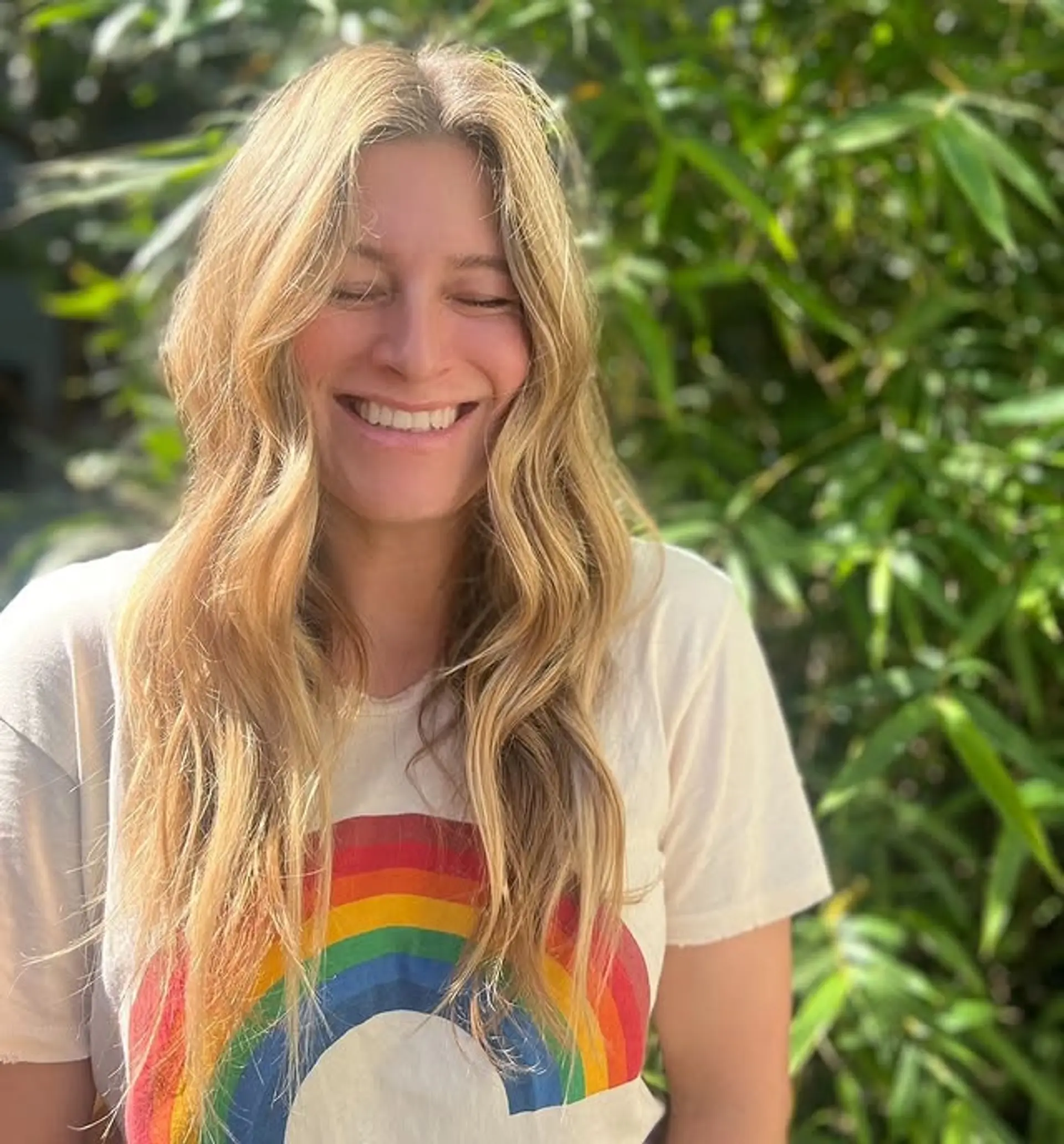 Long layered wavy hairstyle with subtle balayage highlights. 1